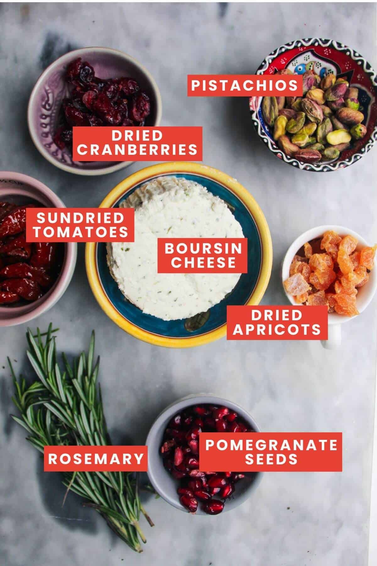 Ingredients for Christmas cheese ball laid out and labelled.