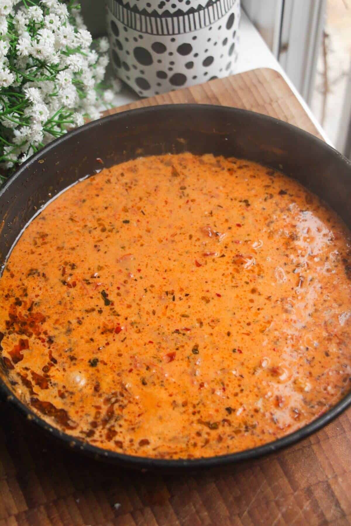 'Marry Me' sauce simmering in a pan.