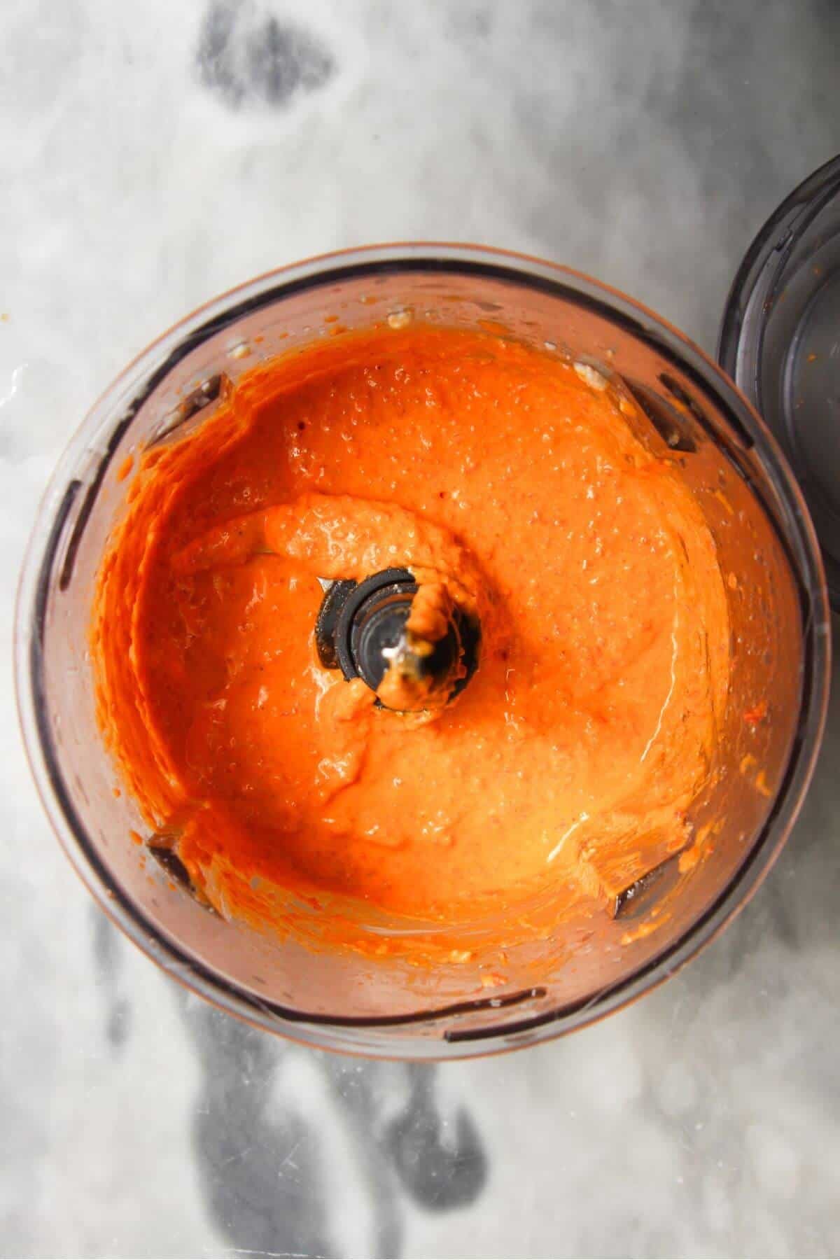 Blitzed red pepper feta dip in a small food processor.