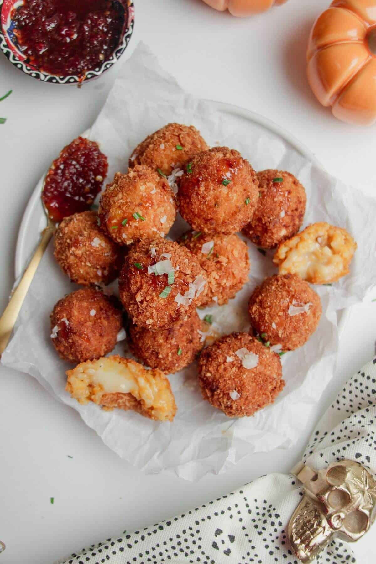 Plate of crispy butternut squash arancini.