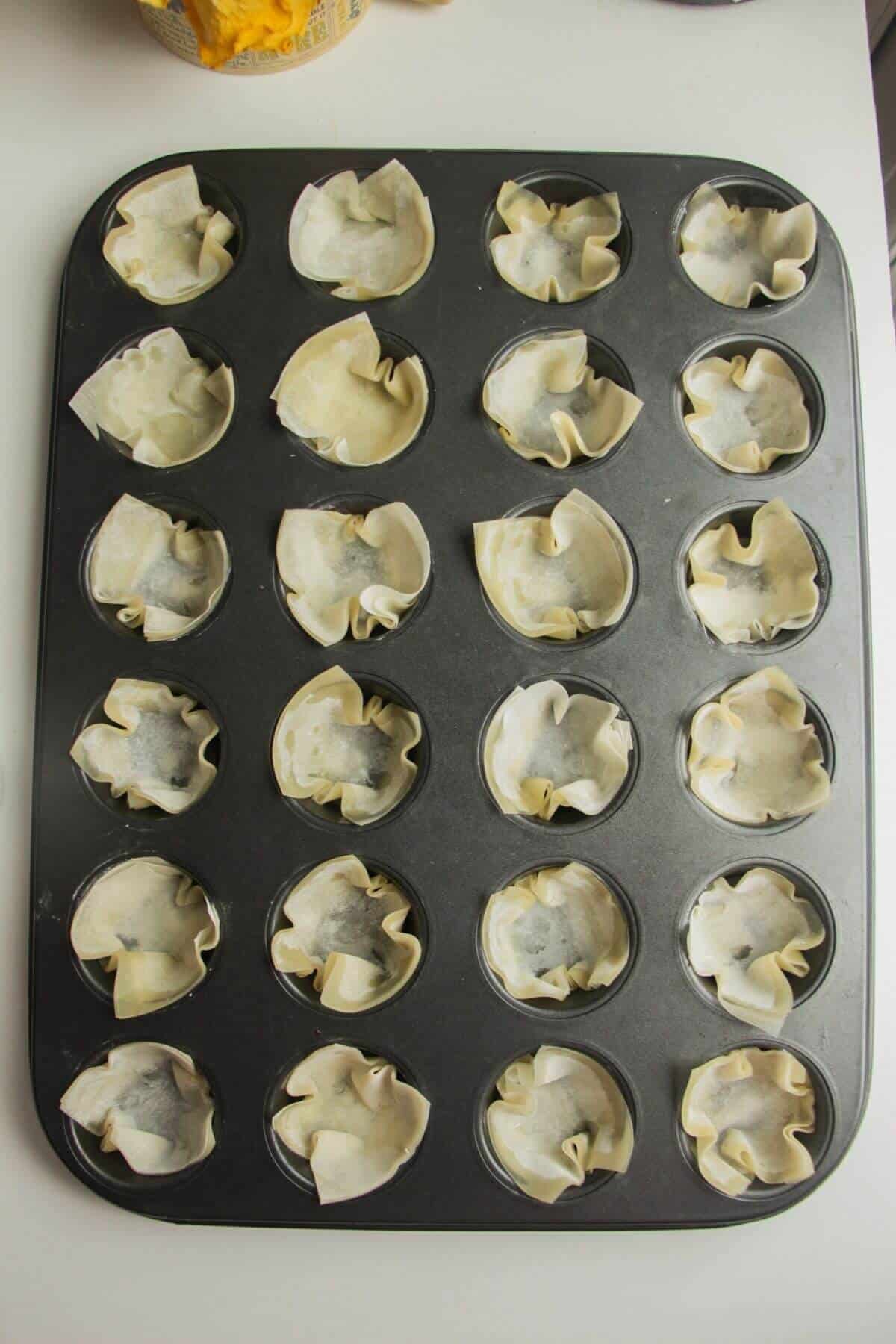 Filo pastry in a mini mufifn tin.