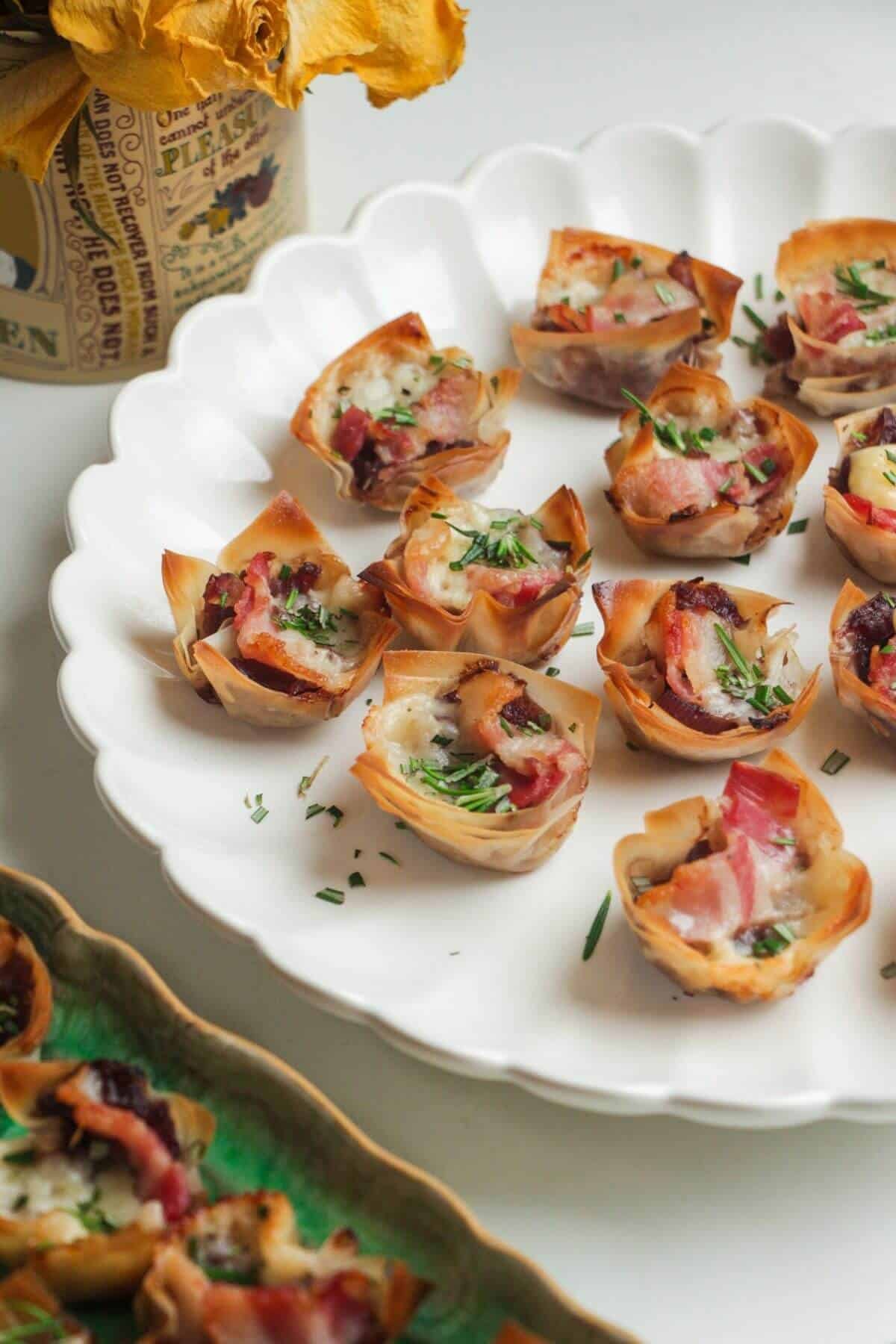 Filo bites on a large scalloped plate.