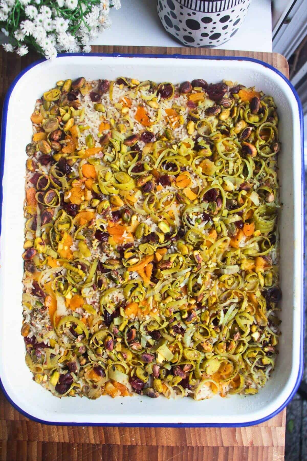 Celebration rice baked in a large white oven dish.