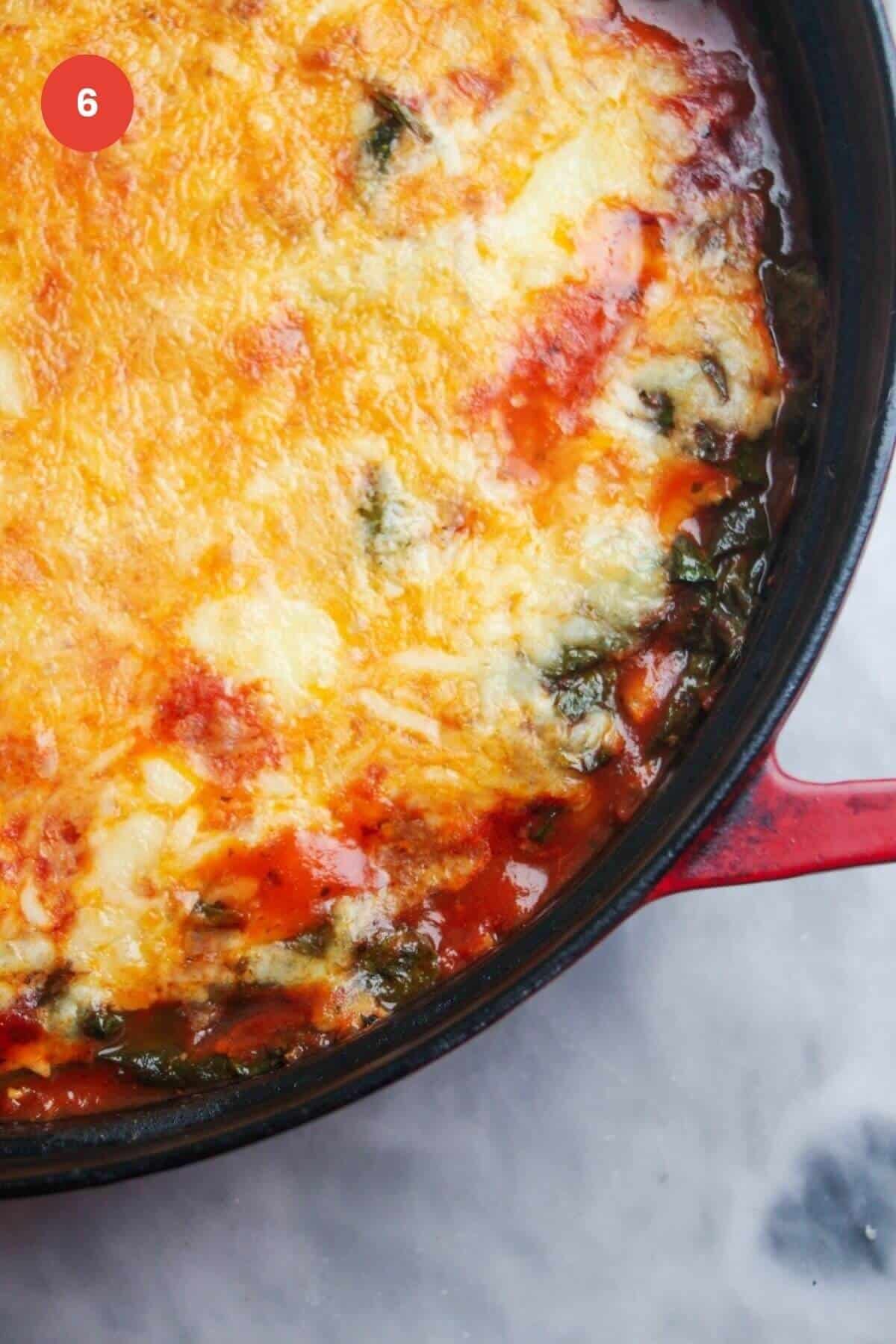 White bean tomato bake out of the oven in a large pan.