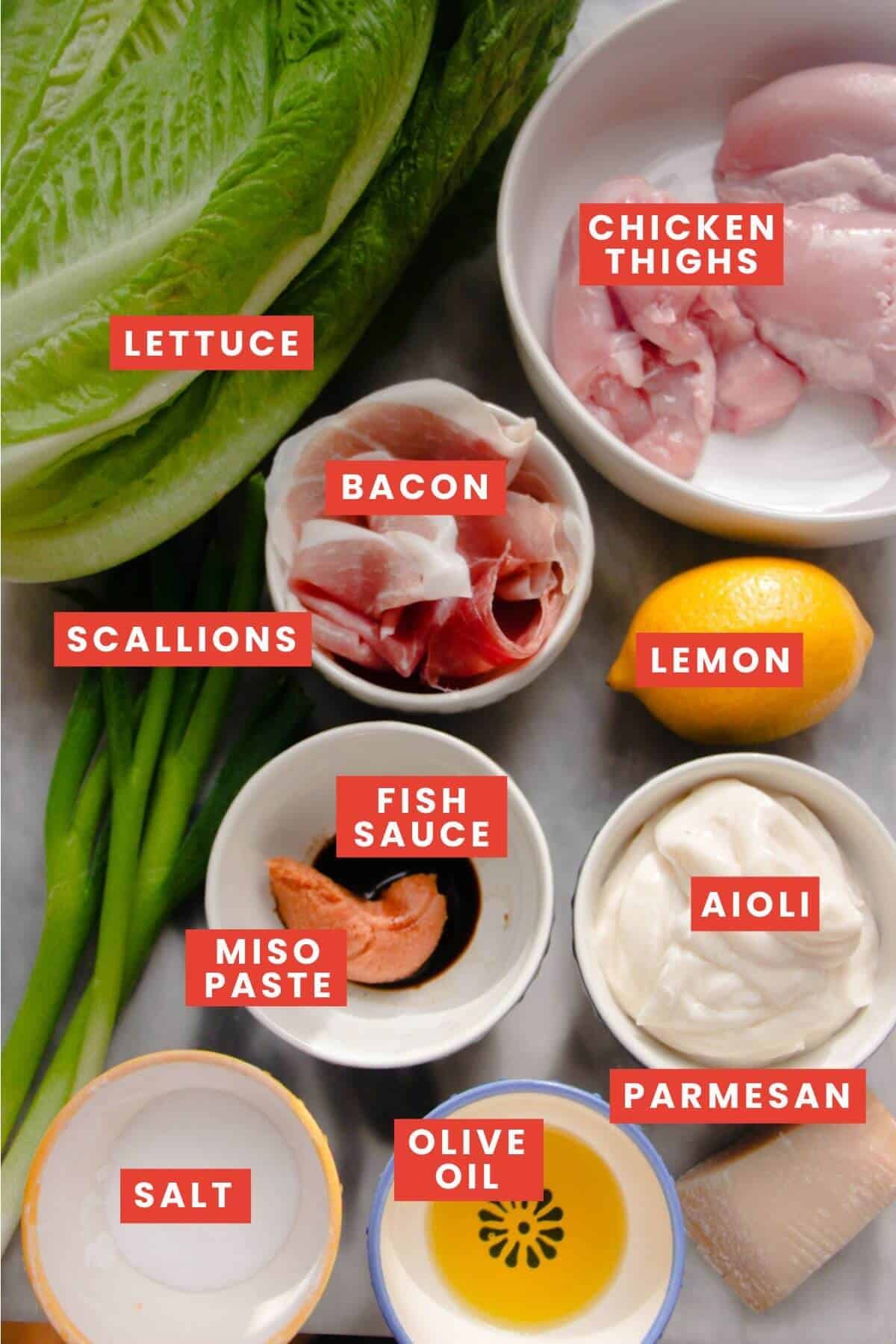 Chicken caesar flatbread ingredients laid out and labelled.