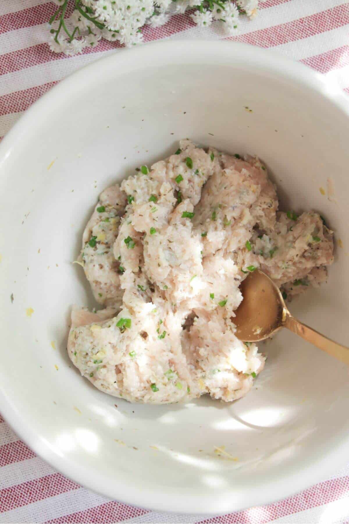 Chicken caesar taco mixture in a large bowl.