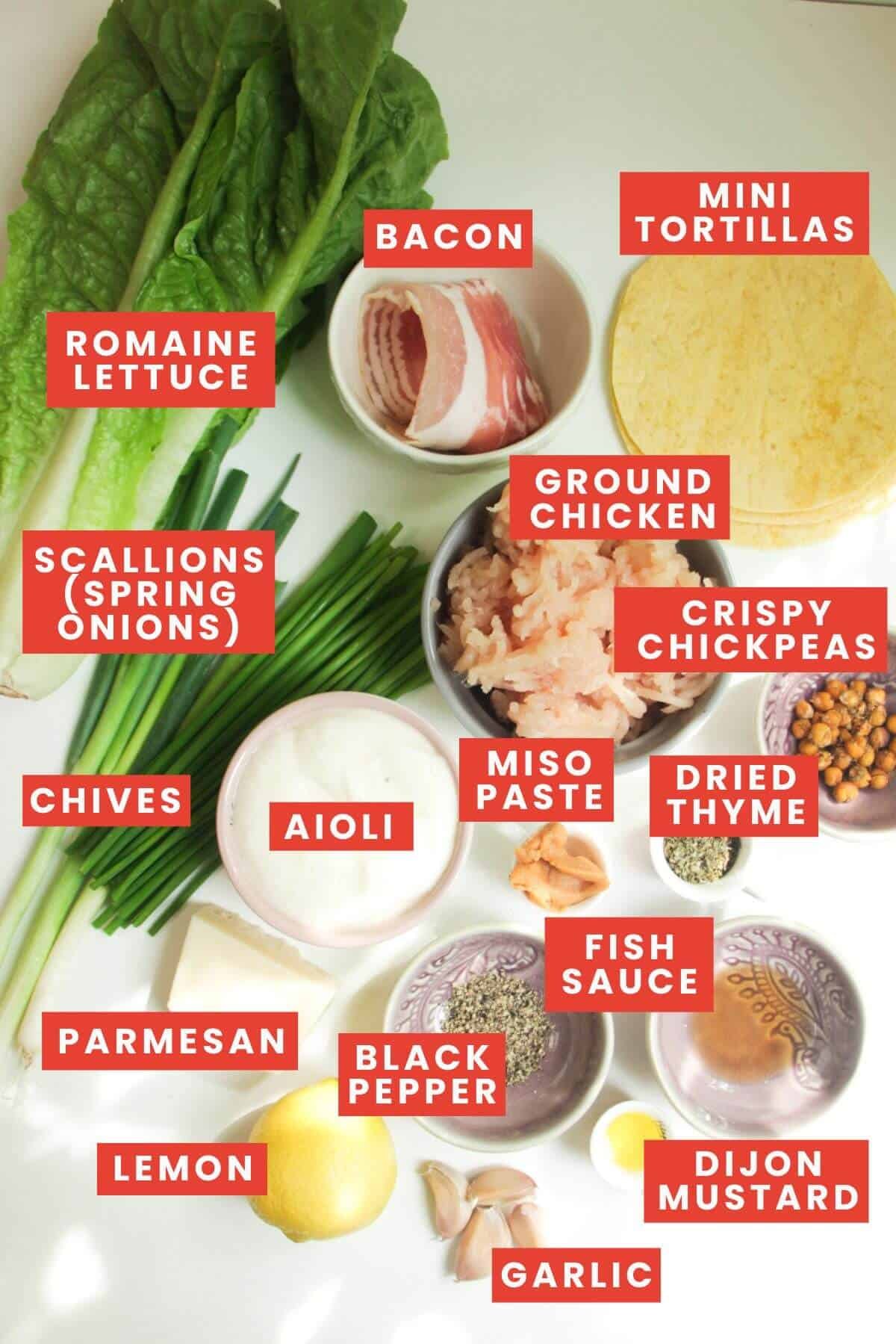 Ingredients for chicken Caesar tacos laid out and labelled.