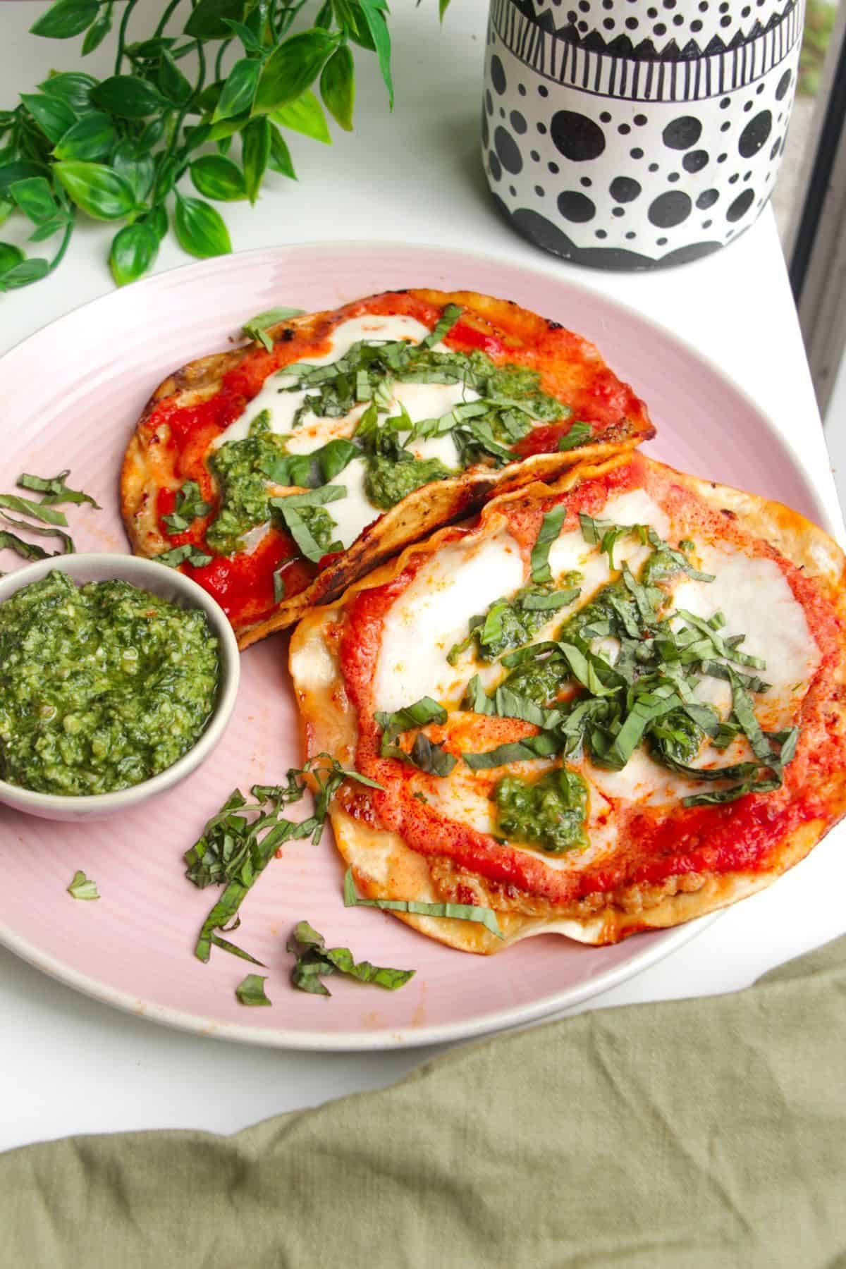 Chicken parmigiana smash tacos on a serving platter.