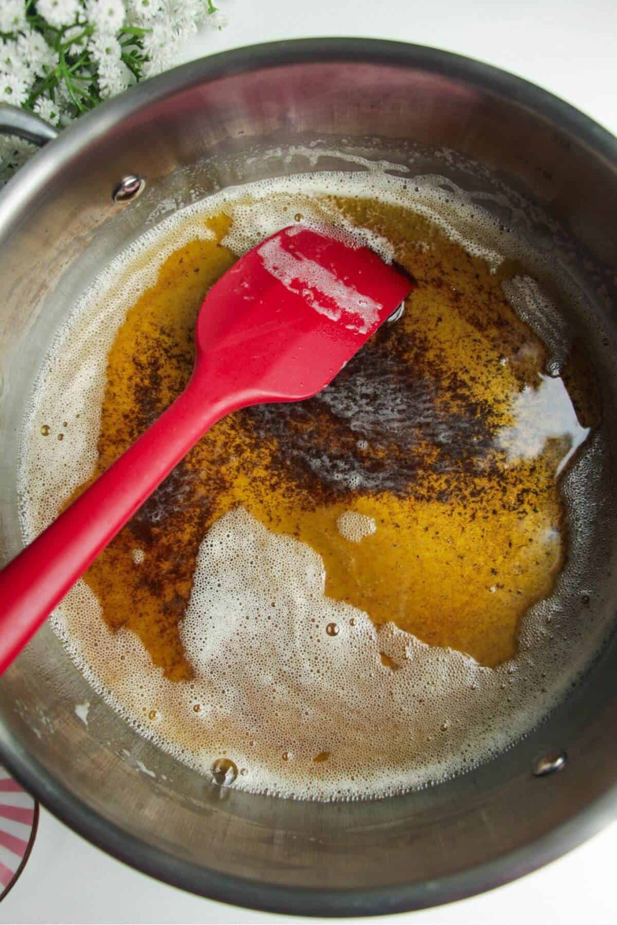 Brown butter in a large stainless steel pan.