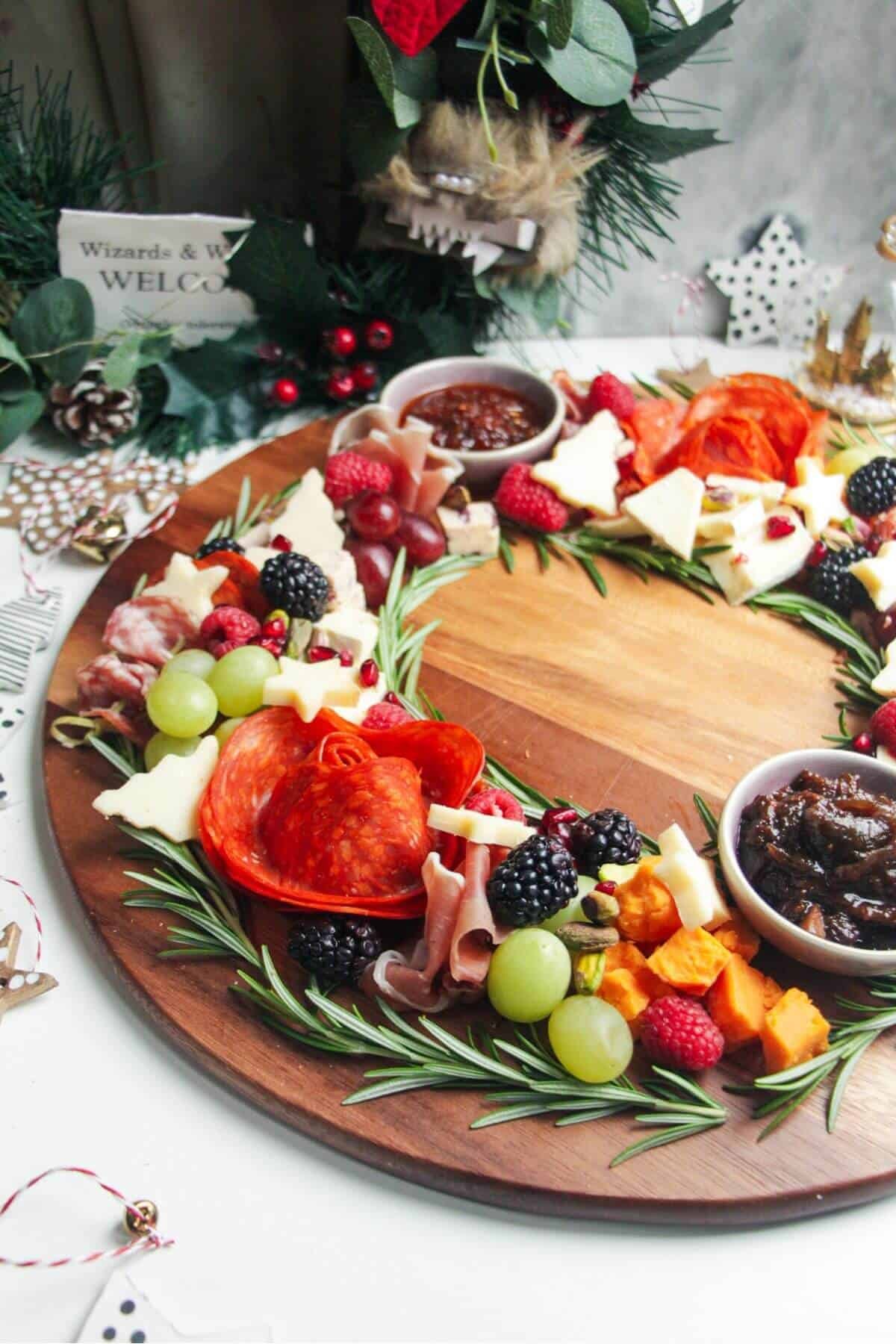 Charcuterie wreath with cured meat, cheeses, chutney.