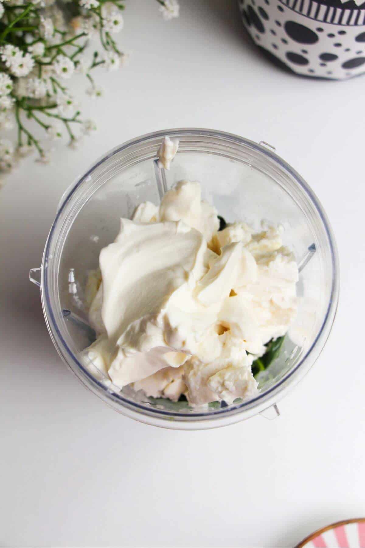 Ingredients for spinach feta dip in blender.