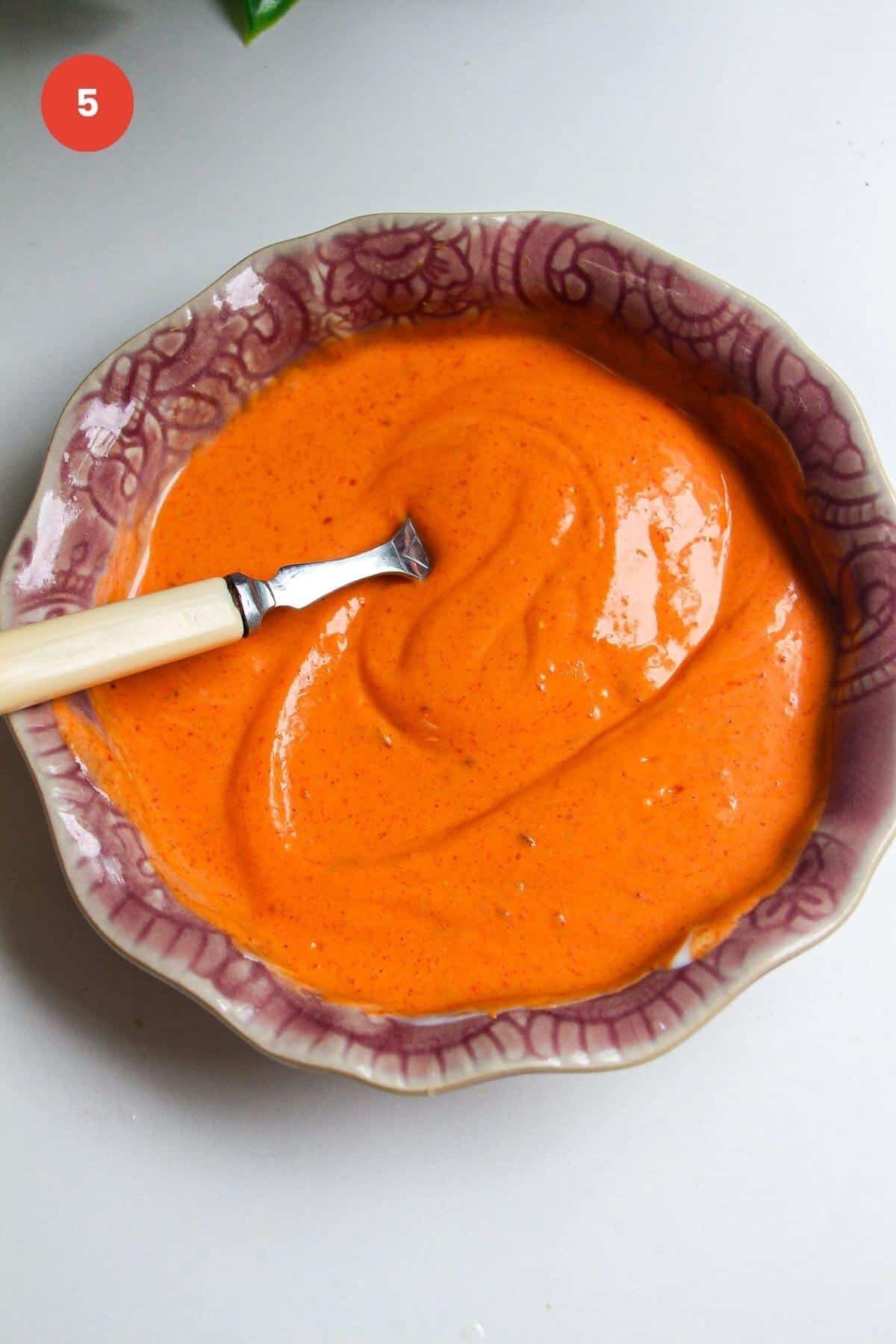 Spicy gochuang sauce in a pink bowl.