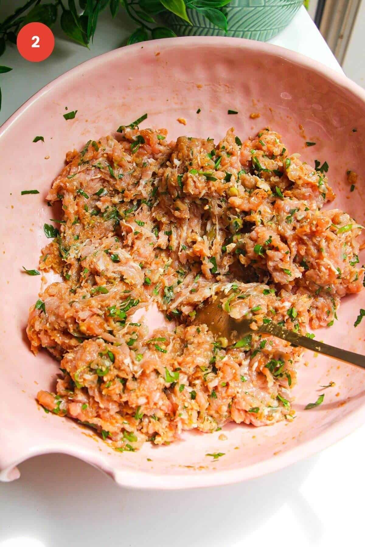 Dumpling meatball mixture mixed.