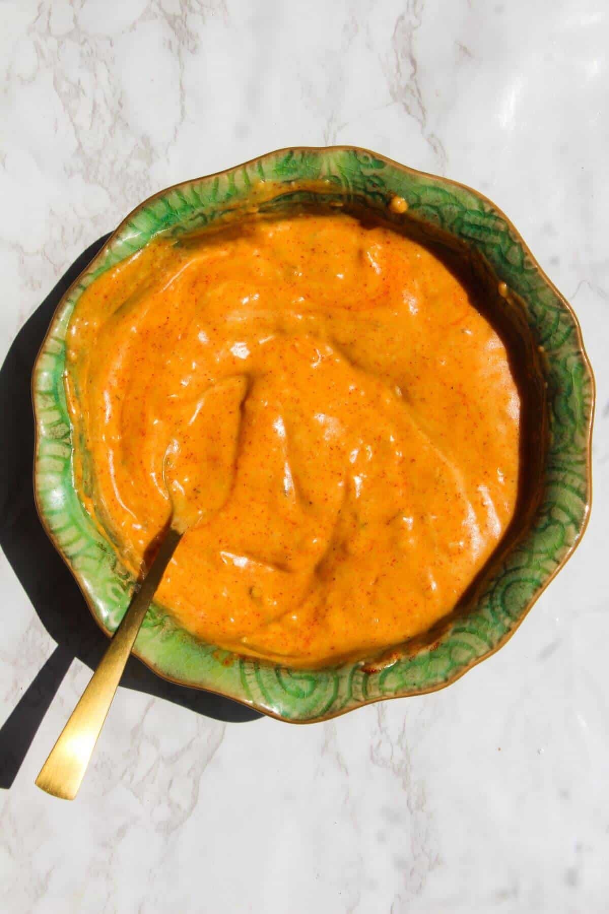 Big Mac sauce mixed in a small green bowl.