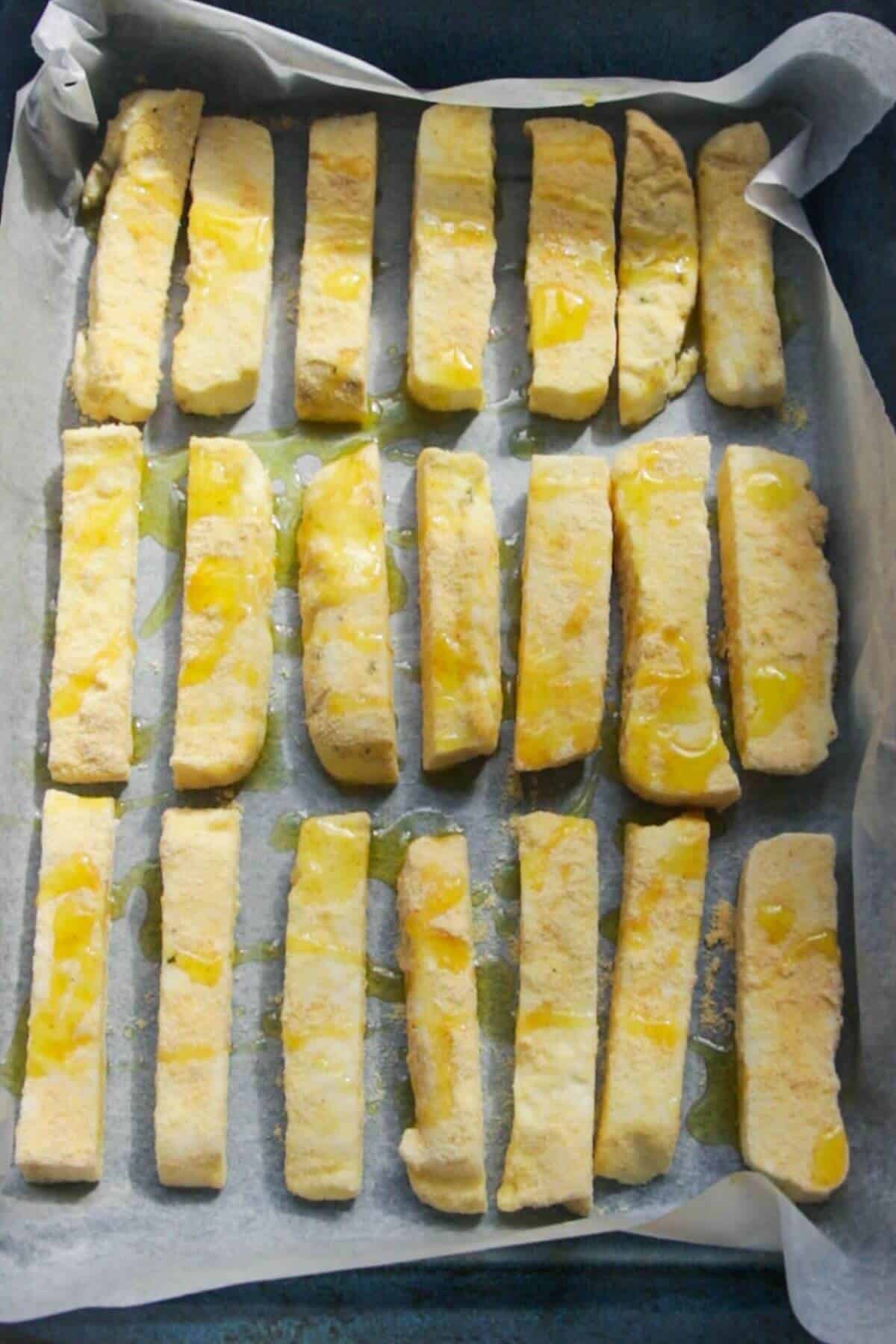 Tray of uncooked halloumi fries.