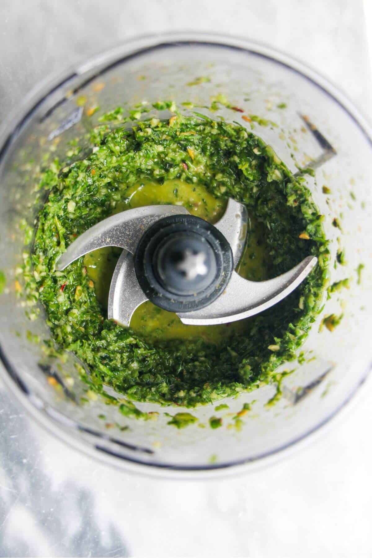 Zhoug sauce blitzed in a food processor.