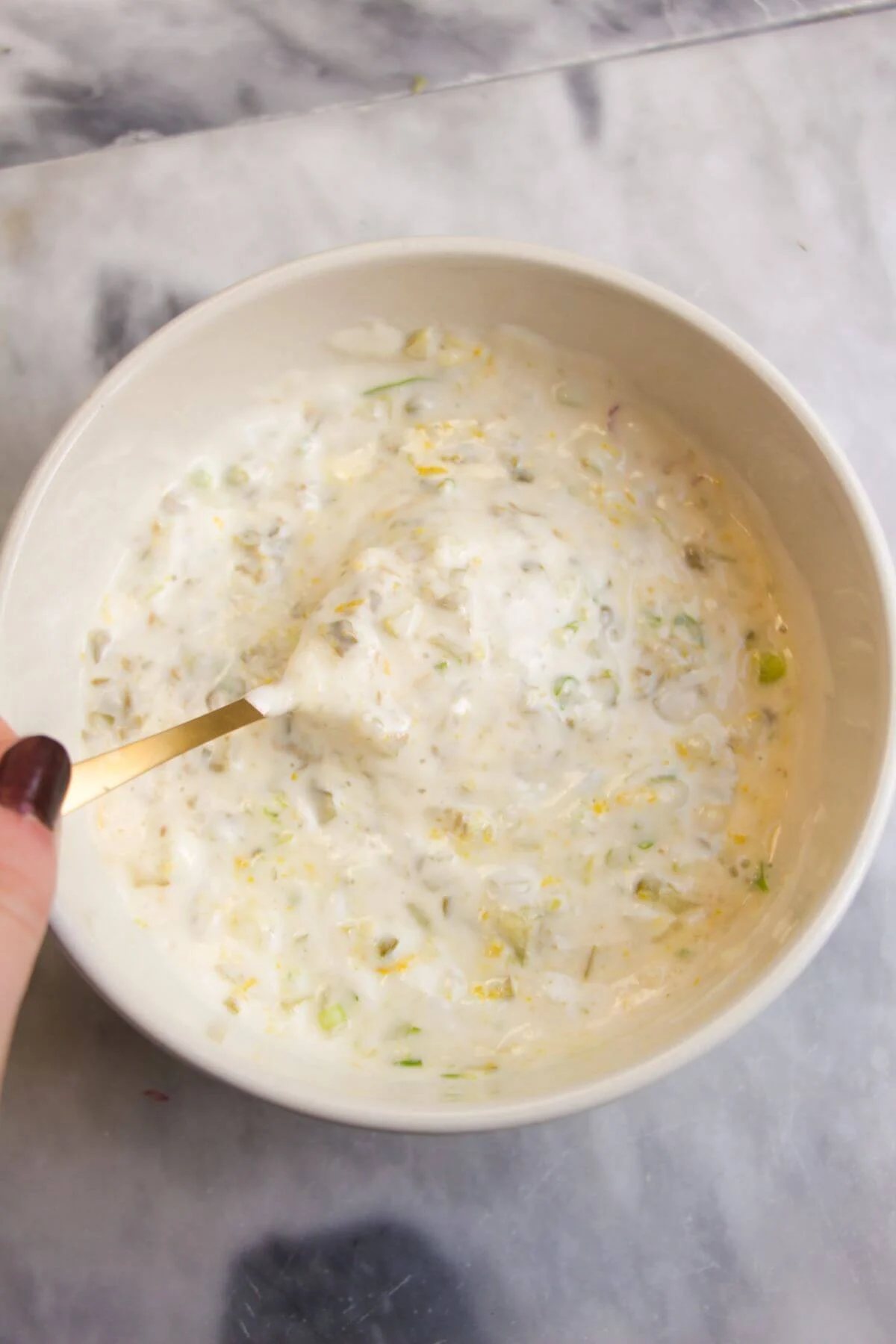 Tartare sauce mixed in a small white bowl.
