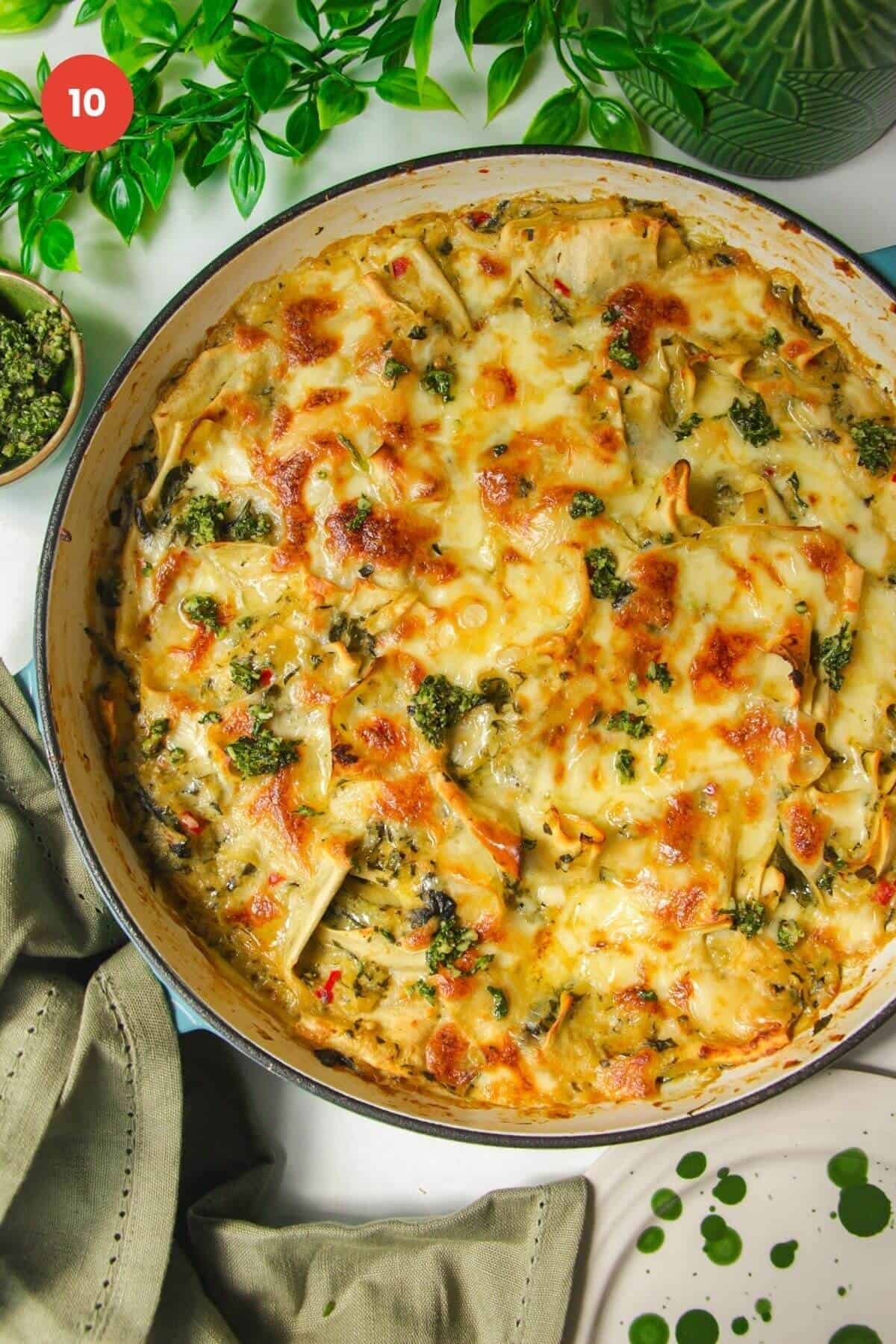 Golden broiled lasagna in a large skillet.
