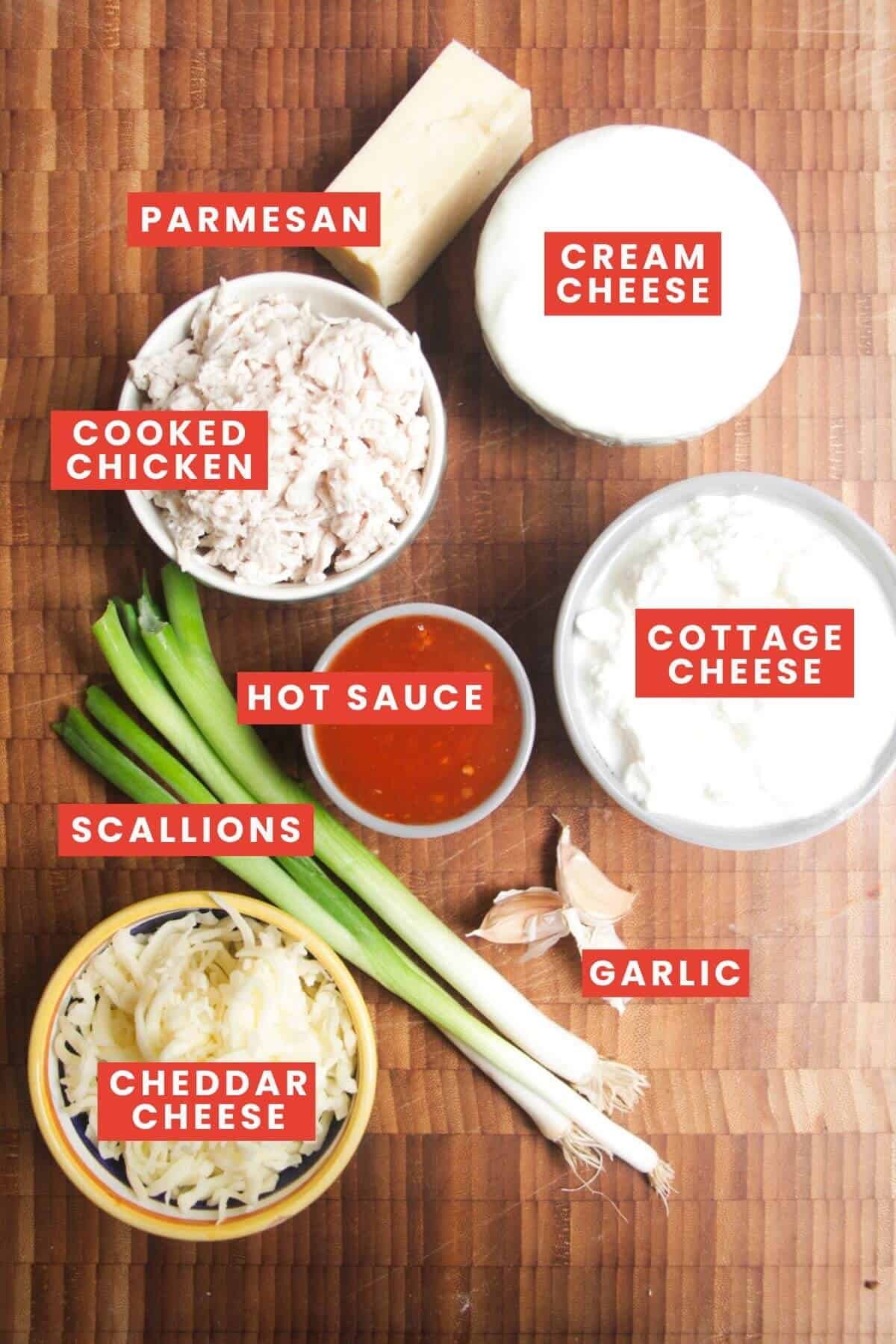 Ingredients for Buffalo chicken dip laid out and labelled.