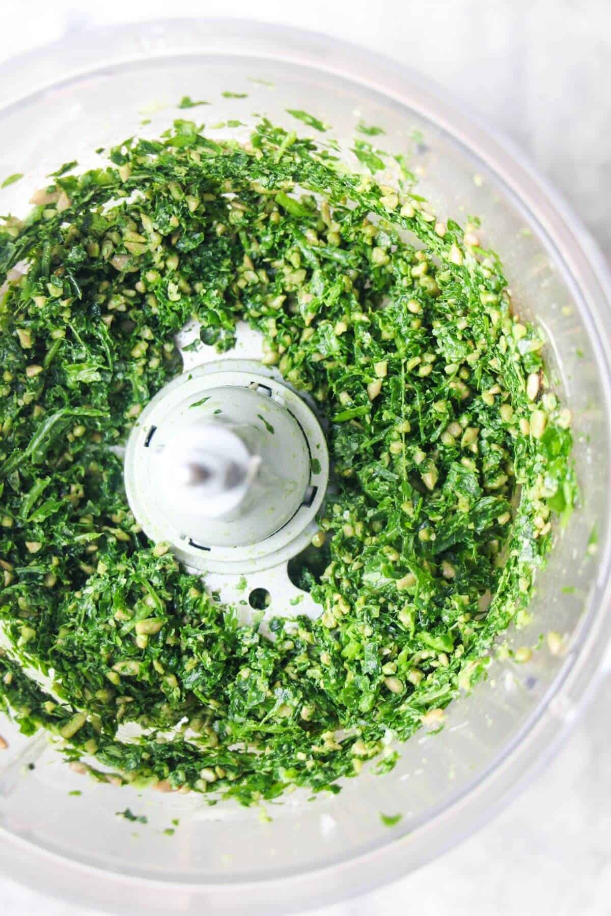 Wild garlic leaves blitzed with parmesan, sunflower seeds, lemon juice and salt in a food processor.