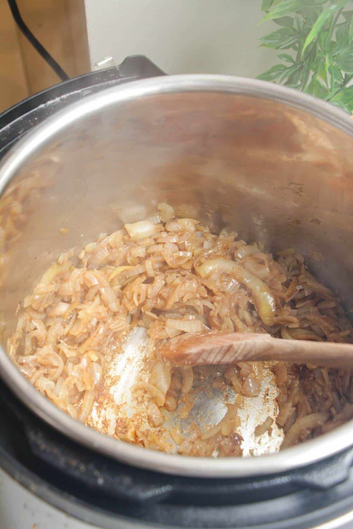 Sauteeing caramelized onions in an Instant Pot.
