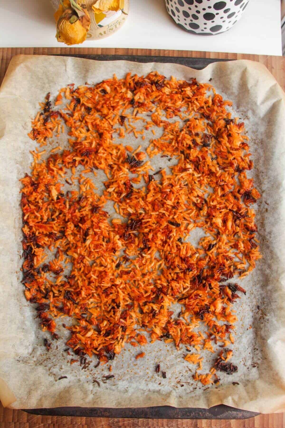 Crispy gochujang rice on a lined tray.