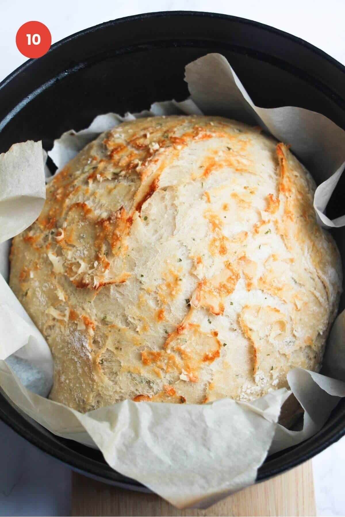 Par baked rosemary parmesan bread in Dutch oven.