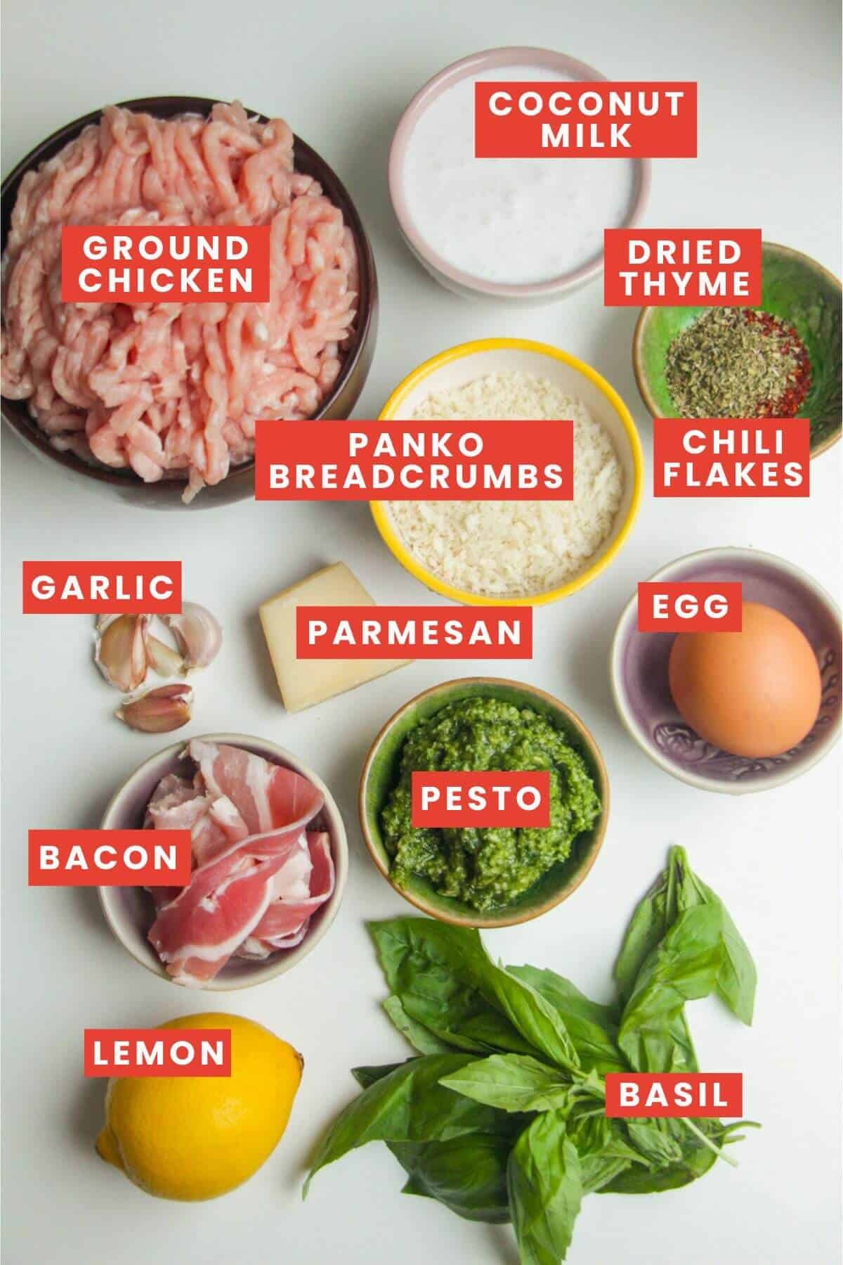 Ingredients for chicken pesto meatballs laid out and labelled.
