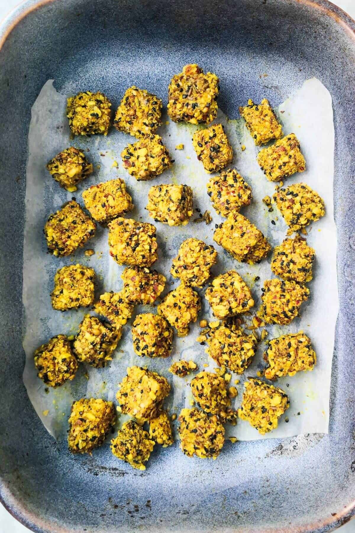 Halloumi bites in a blue oven dish.