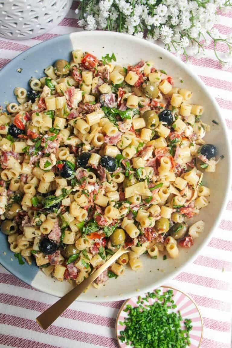 Italian deli antipasti pasta salad in a large serving bowl.