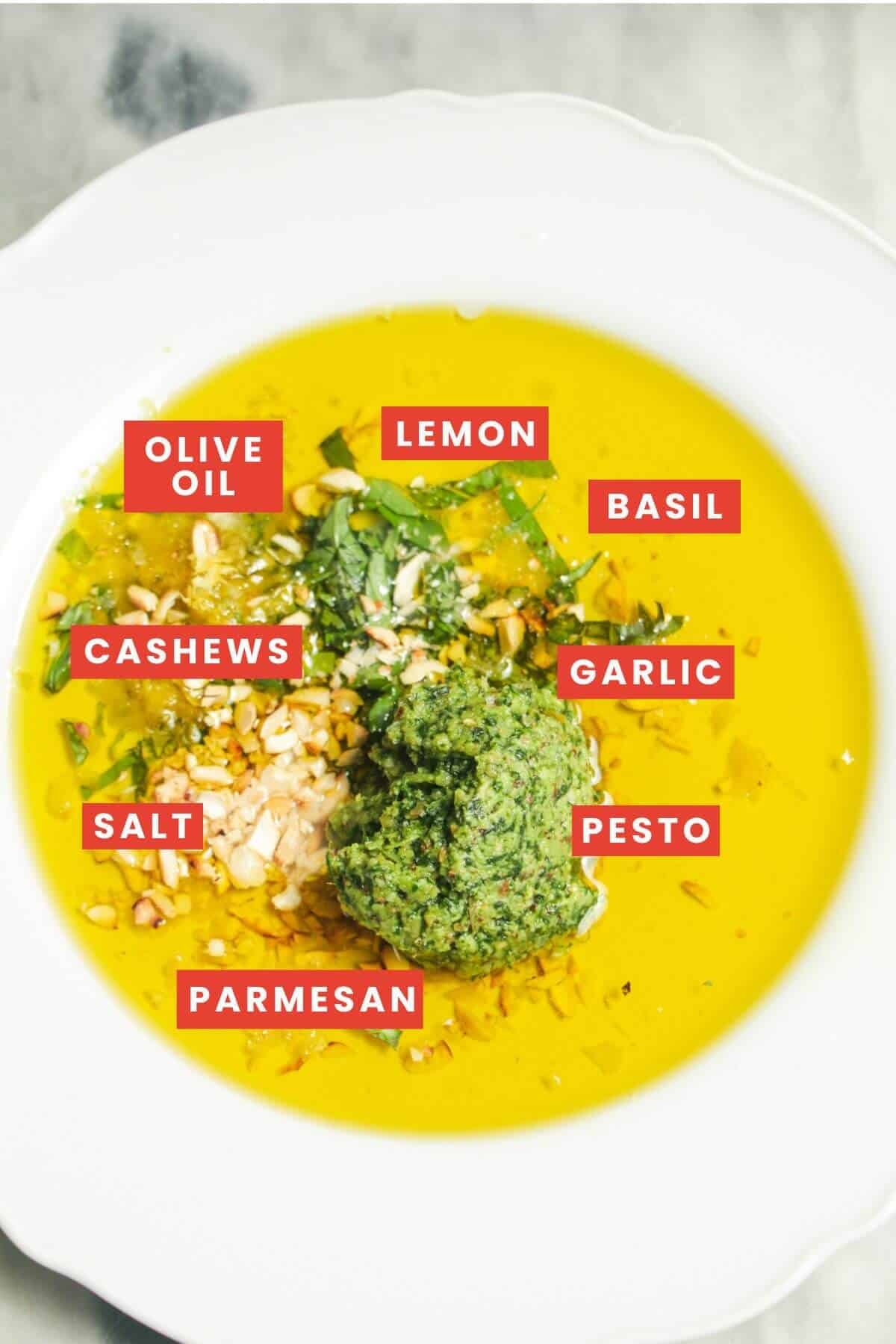 Ingredients for pesto dipping oil laid out and labelled.