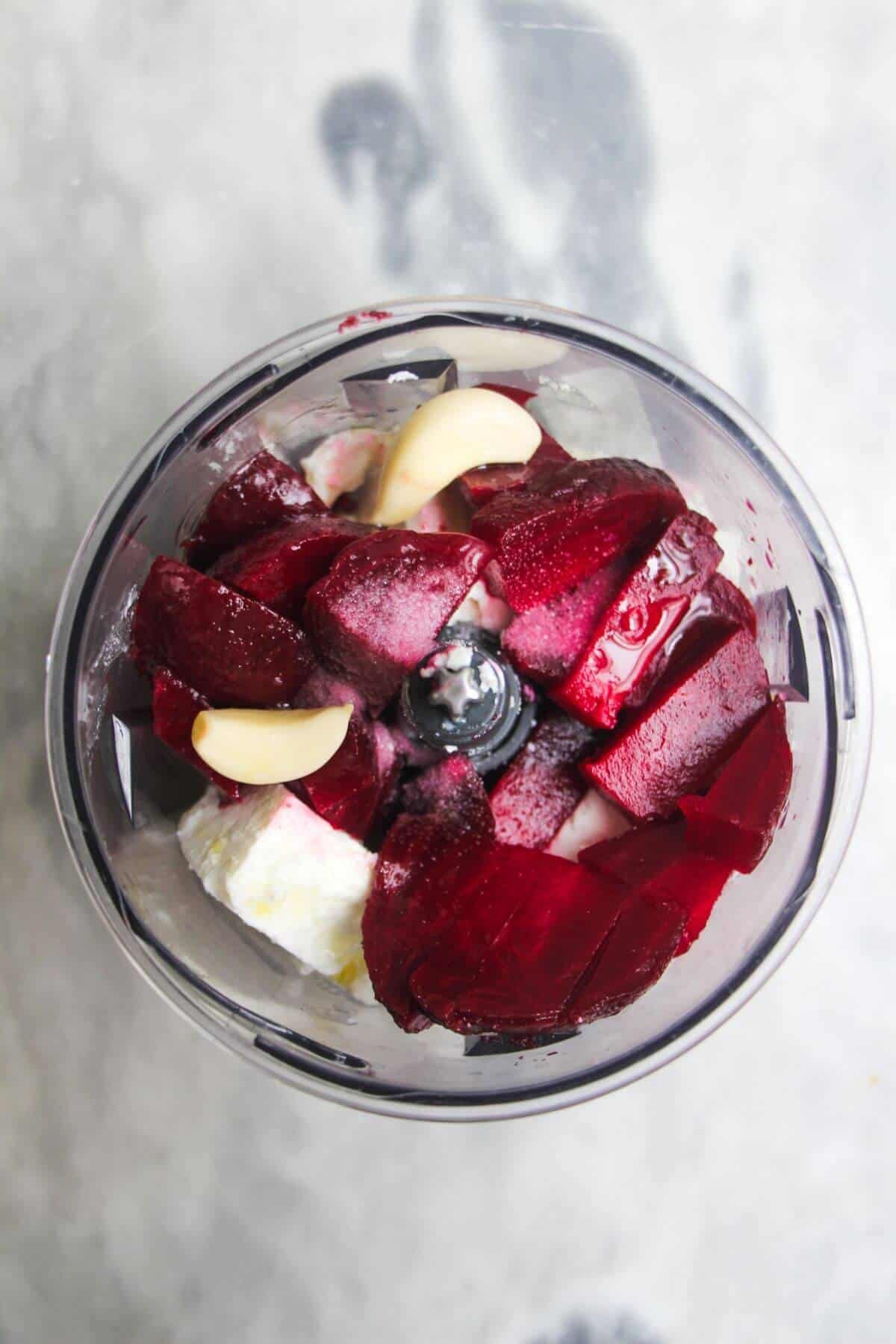 Beetroot, garlic, feta in a small food processor.