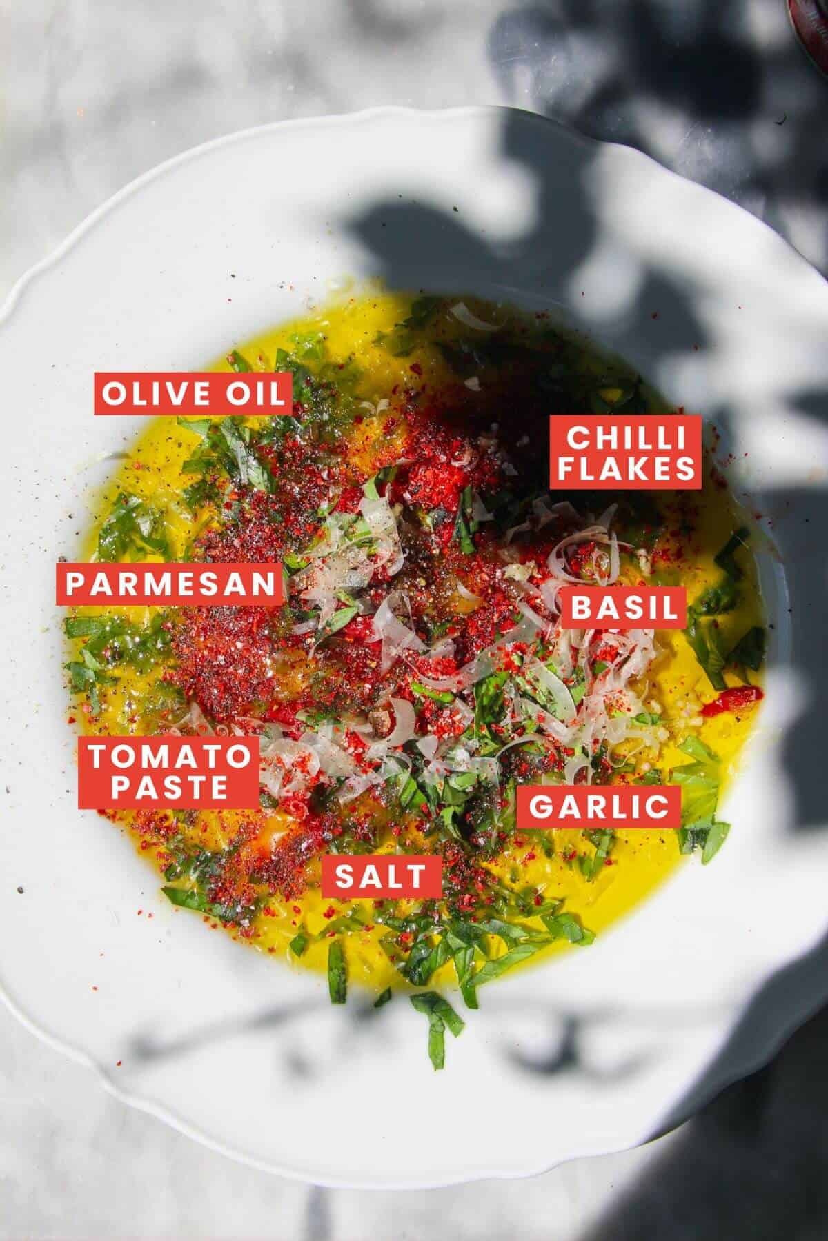 Pizza bread dipping oil ingredients laid out and labelled.
