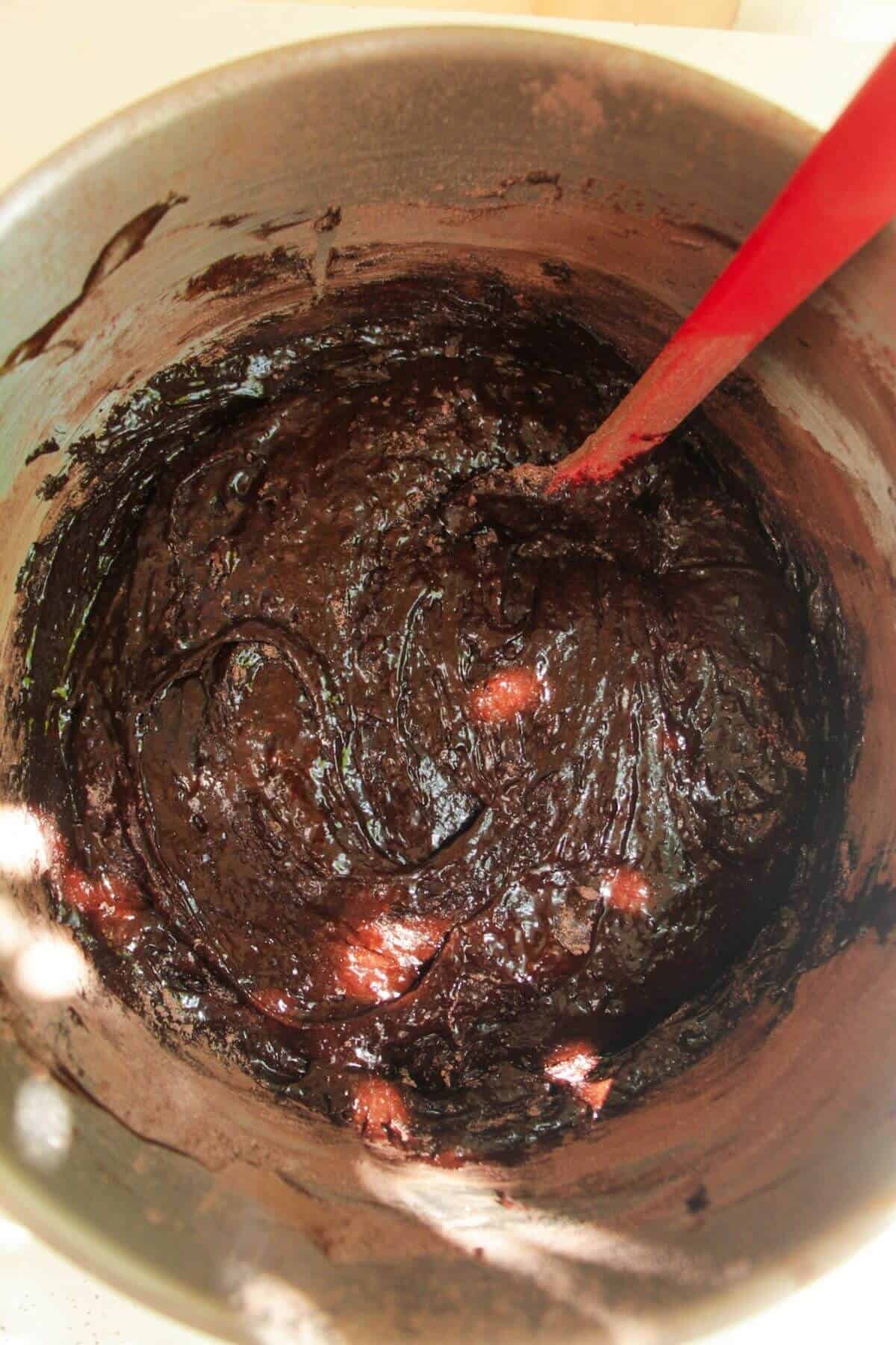 Salted caramel brownie batter in mixing bowl.