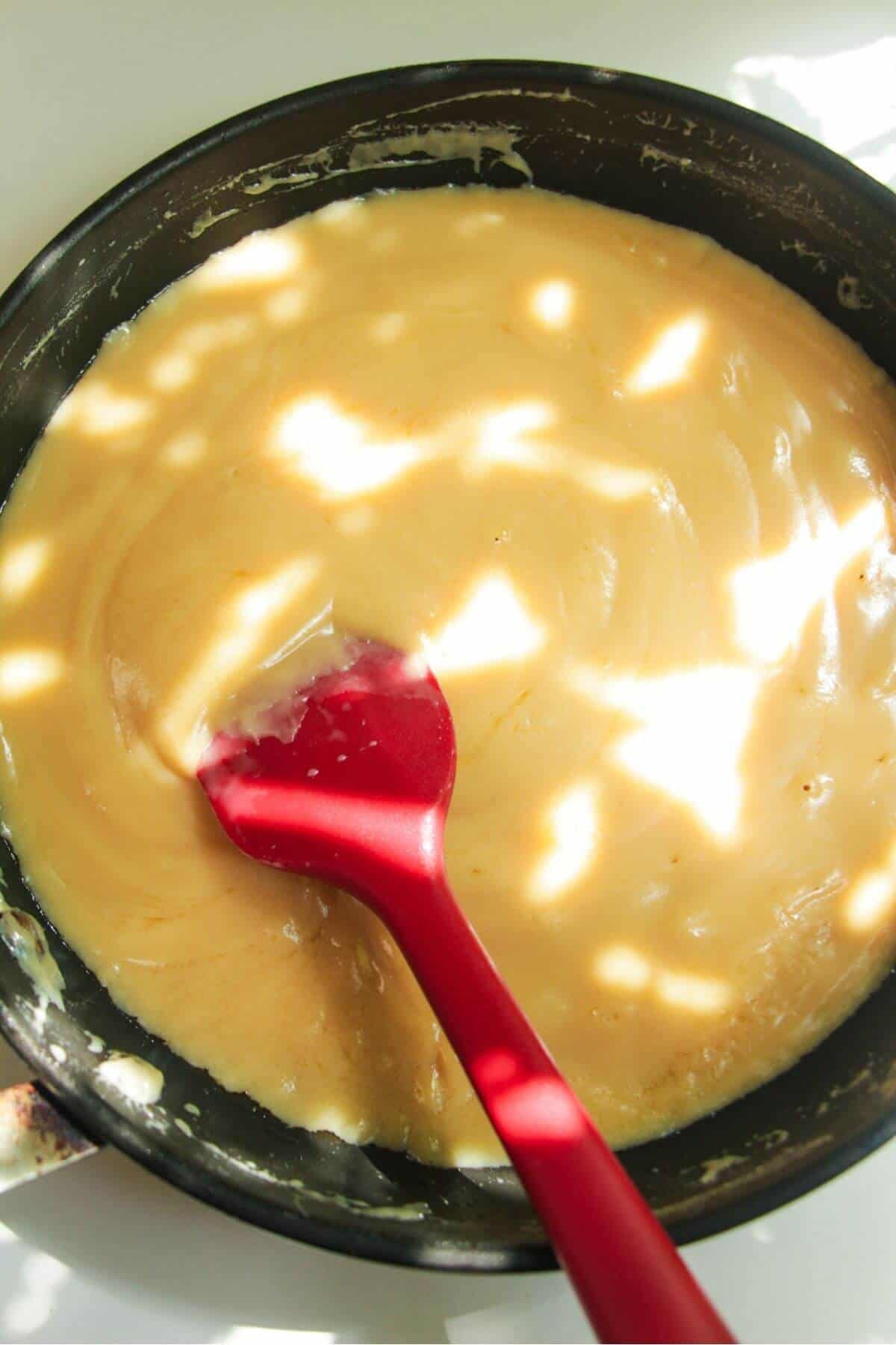 Condensed milk and butter in a small pan.