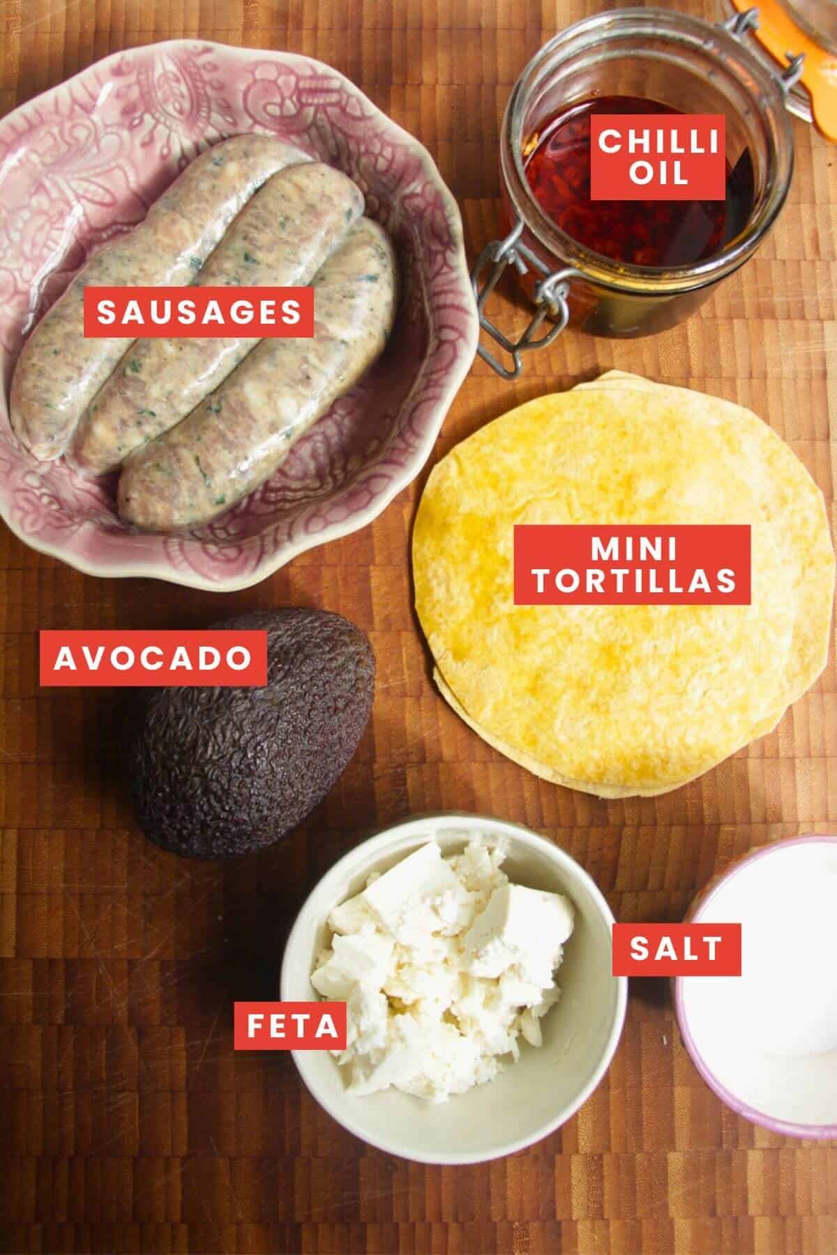 Ingredients for smash sausage breakfast tacos laid out and labelled.