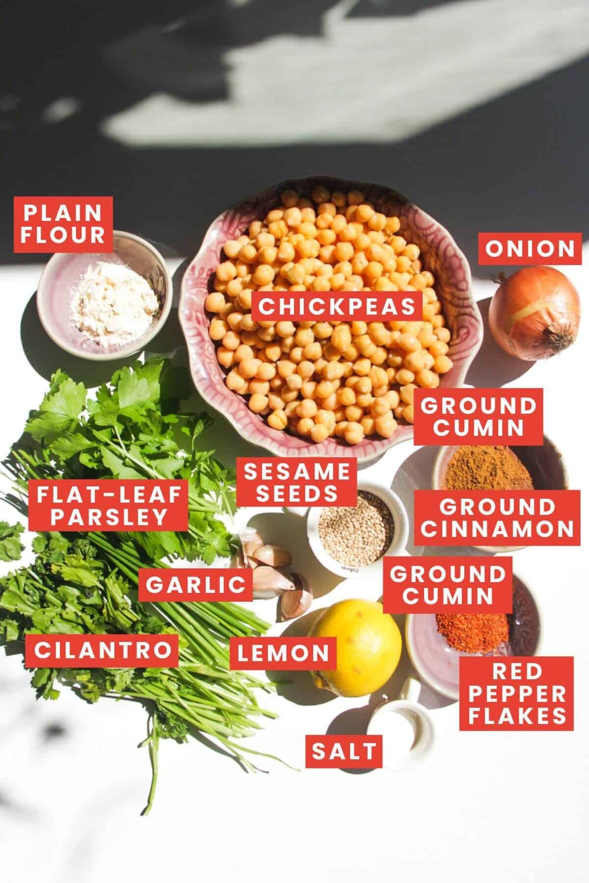 Ingredients for smash falafel tacos laid out and labelled.