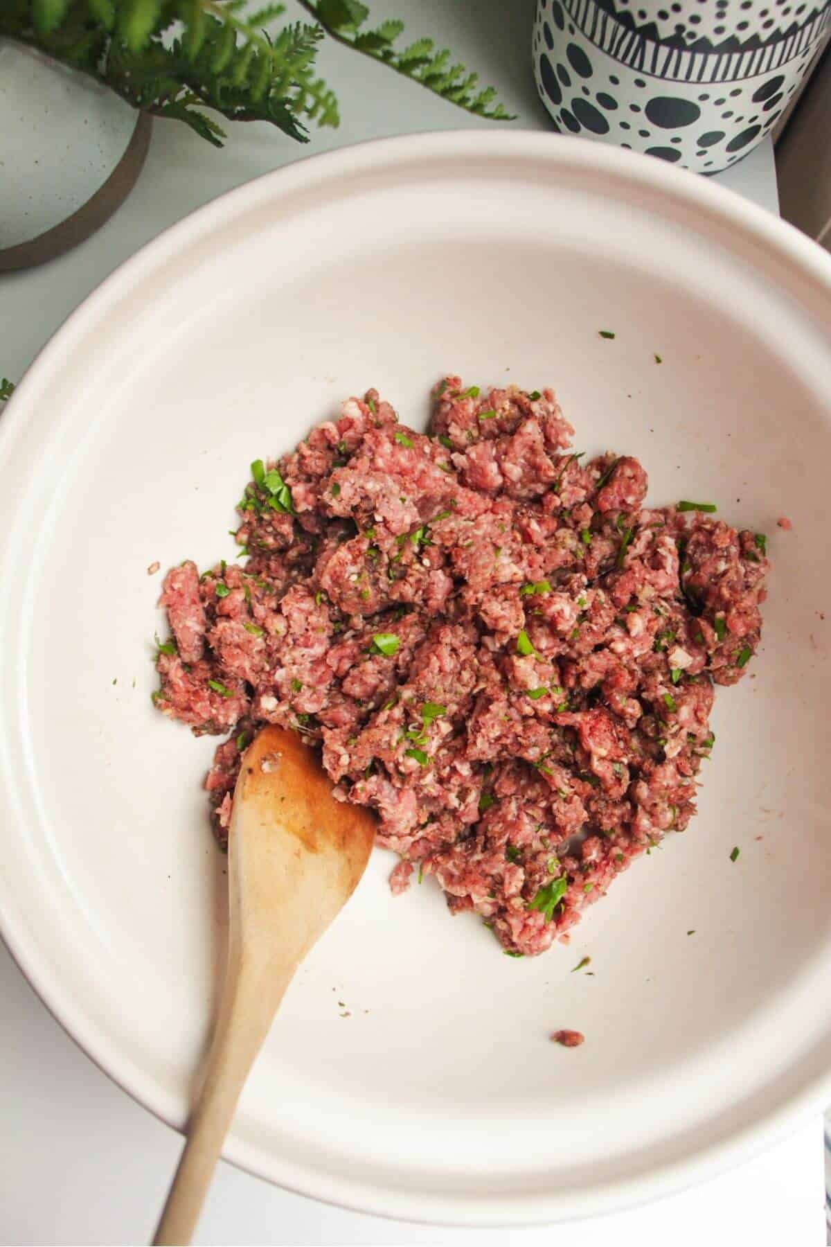 Kebab taco mixture combined in a large bowl.