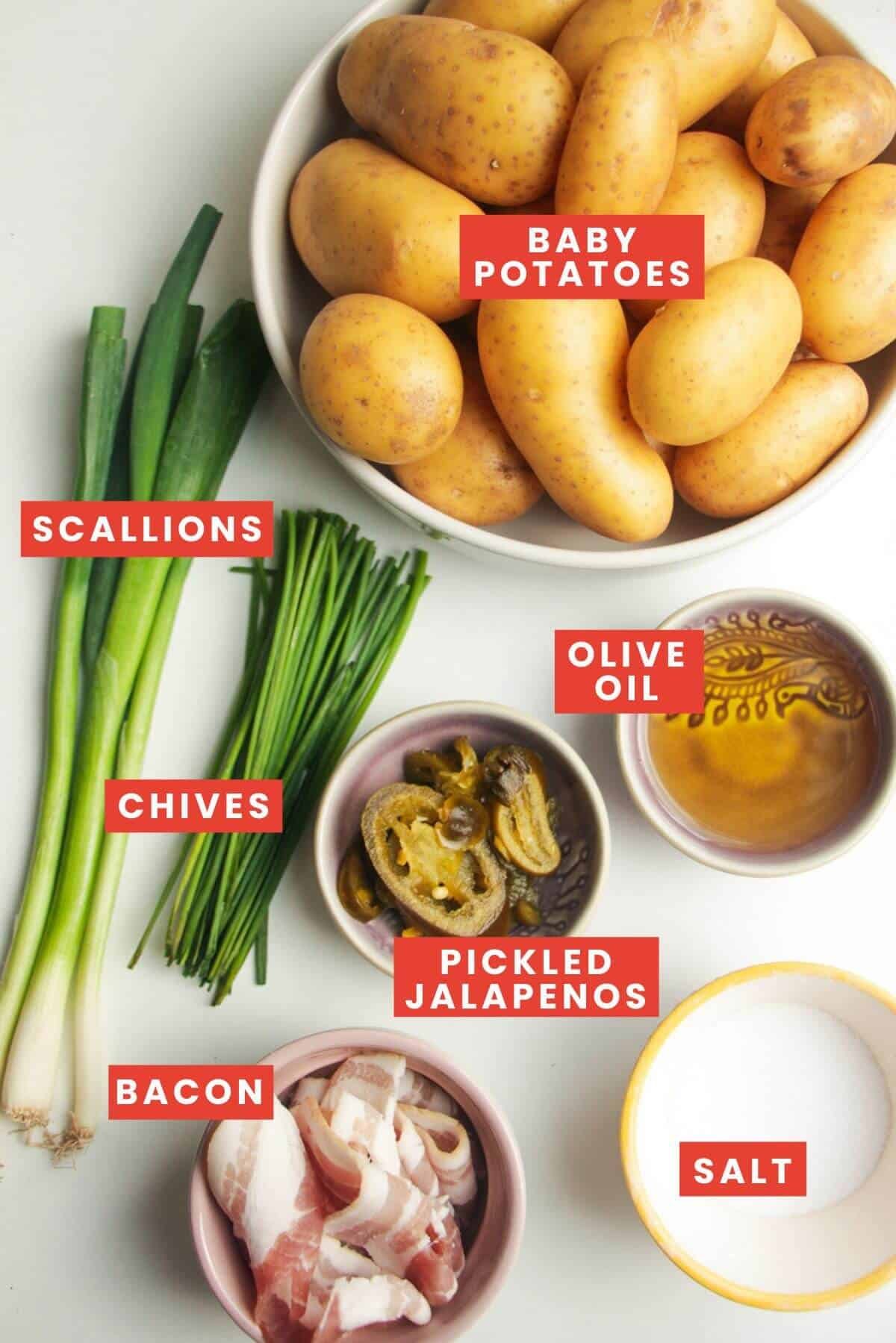 Ingredients for smashed potato salad laid out and labelled.