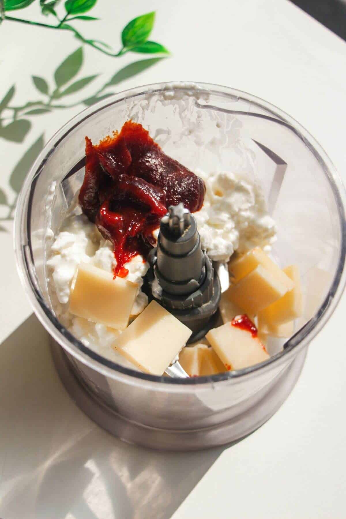 Cottage cheese, parmesan and gochujang paste in a small blender.