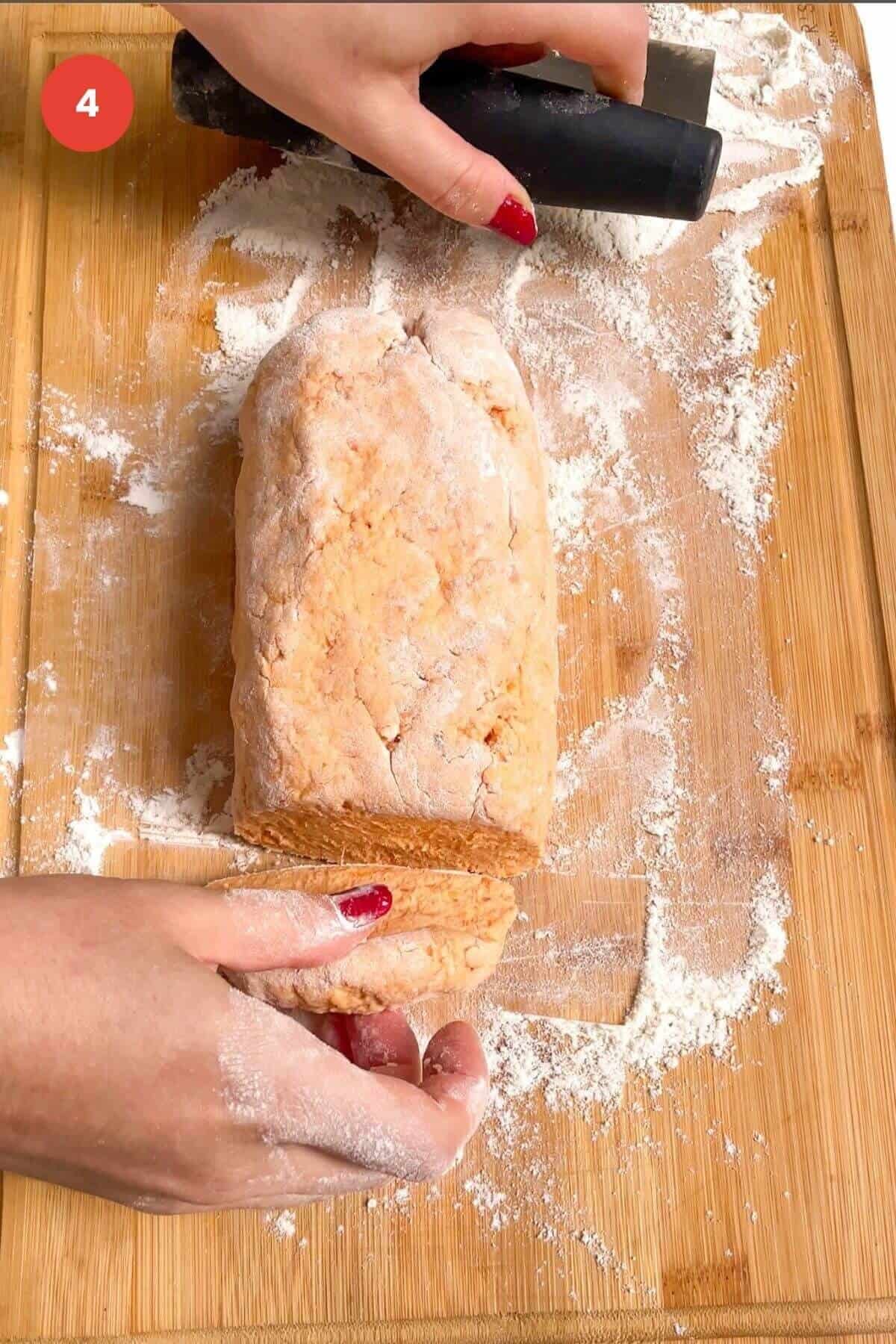 Sweet potato gnocchi dough on board.