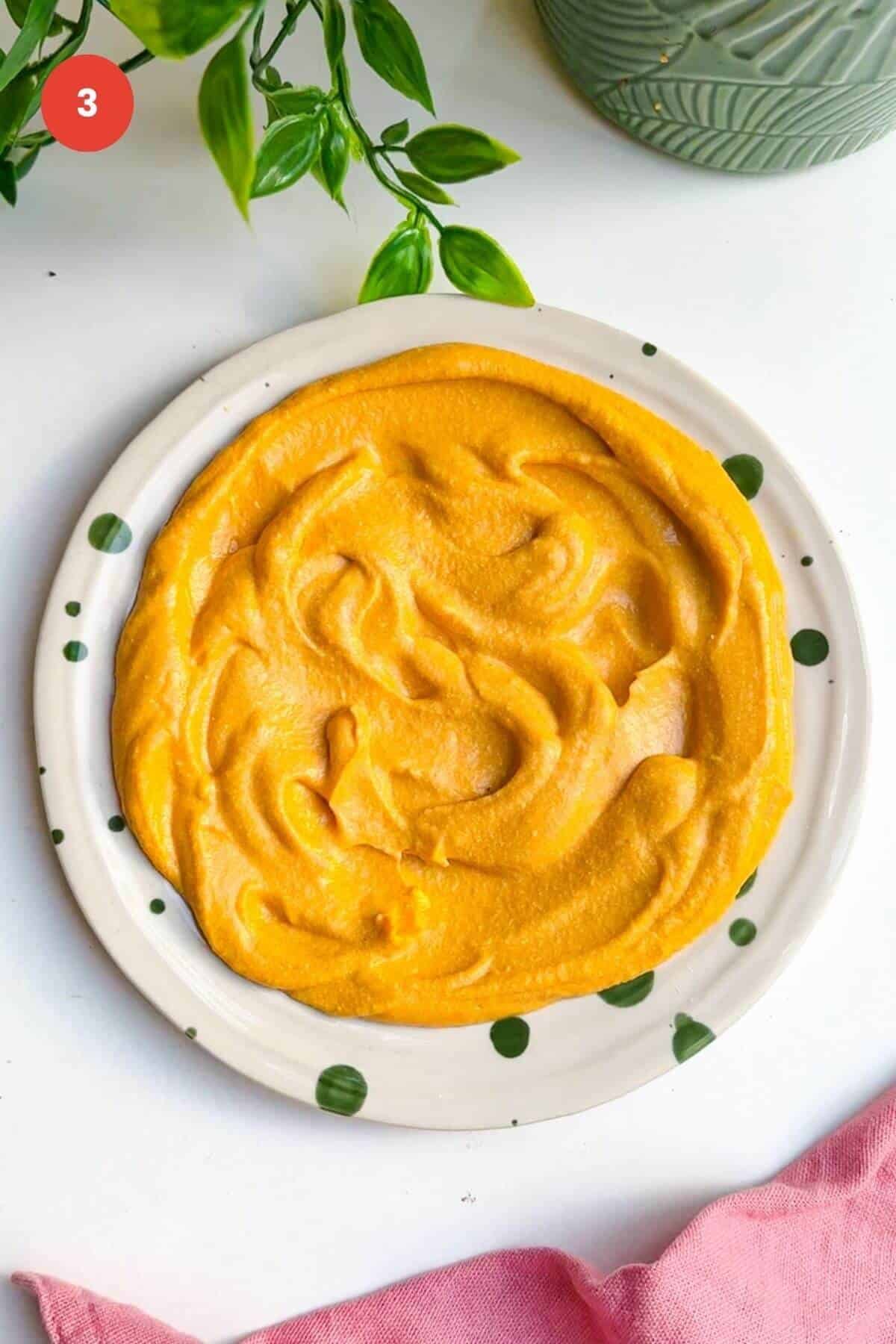 Whipped butternut squash feta dip on plate.