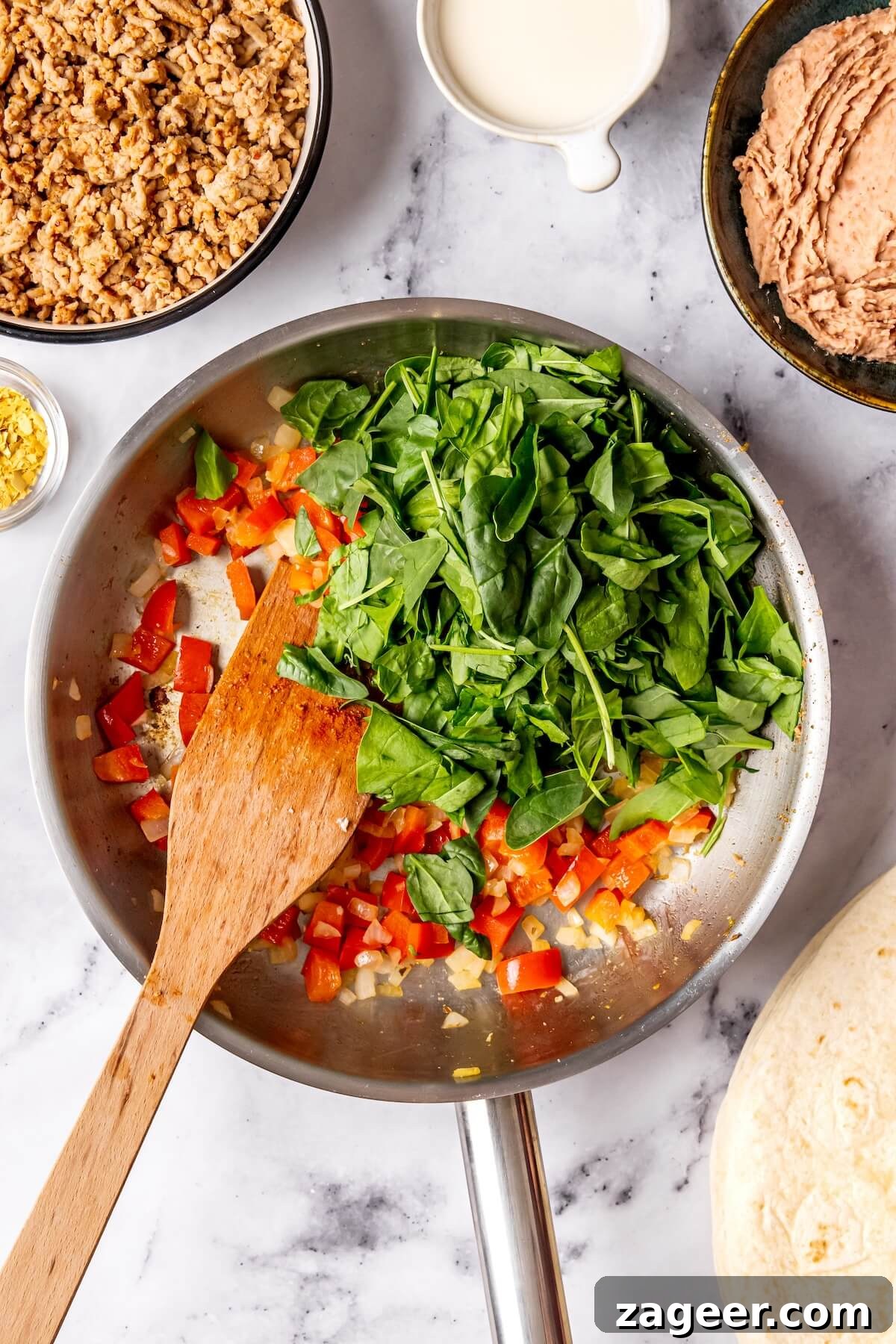 Your Go-To Gluten-Free Frozen Breakfast Burritos 9 Whisking Eggs for Gluten-Free Breakfast Burritos - Olivia Adriance