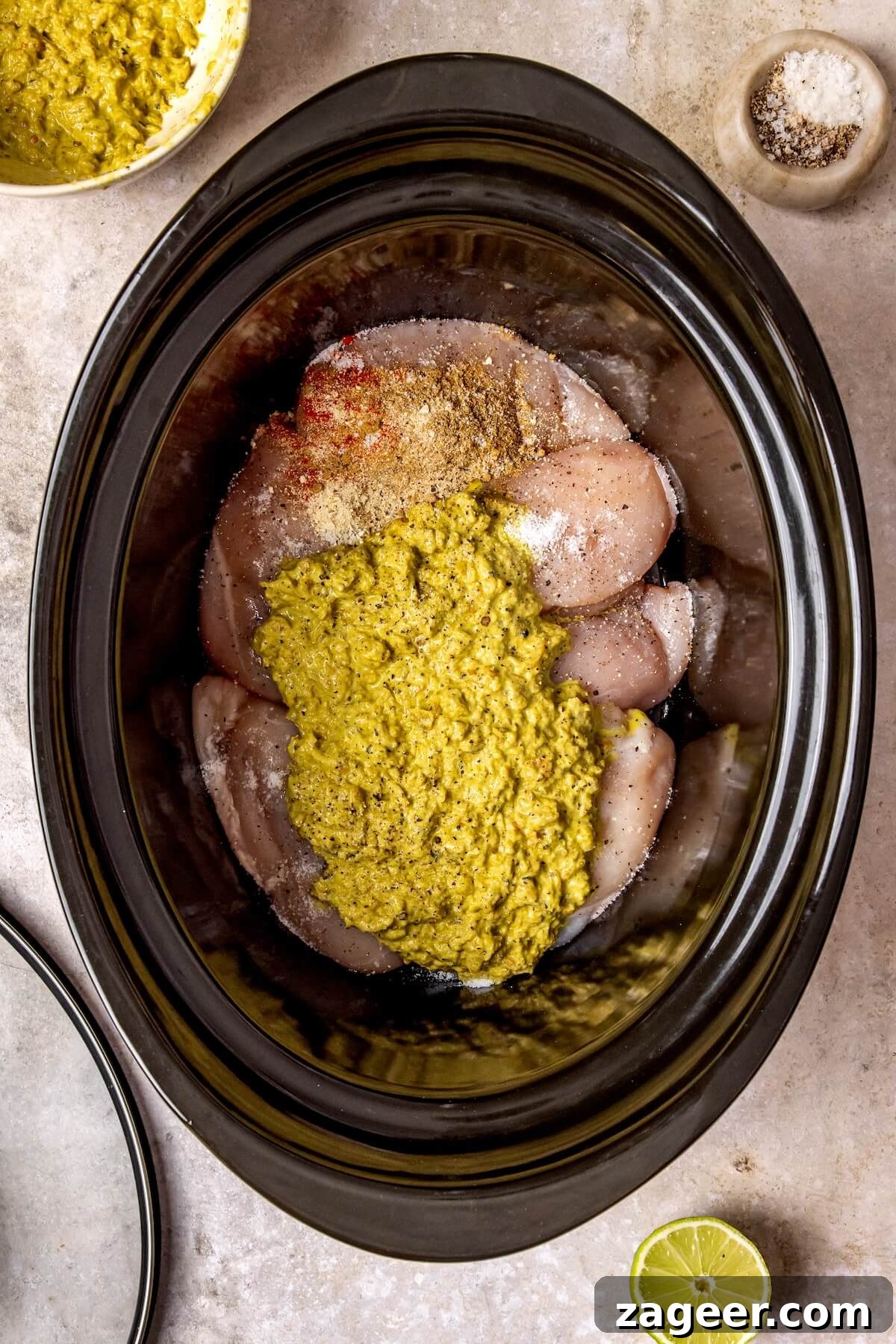 Zesty Slow Cooker Salsa Verde Chicken Tacos 7 Chicken and salsa verde added to slow cooker