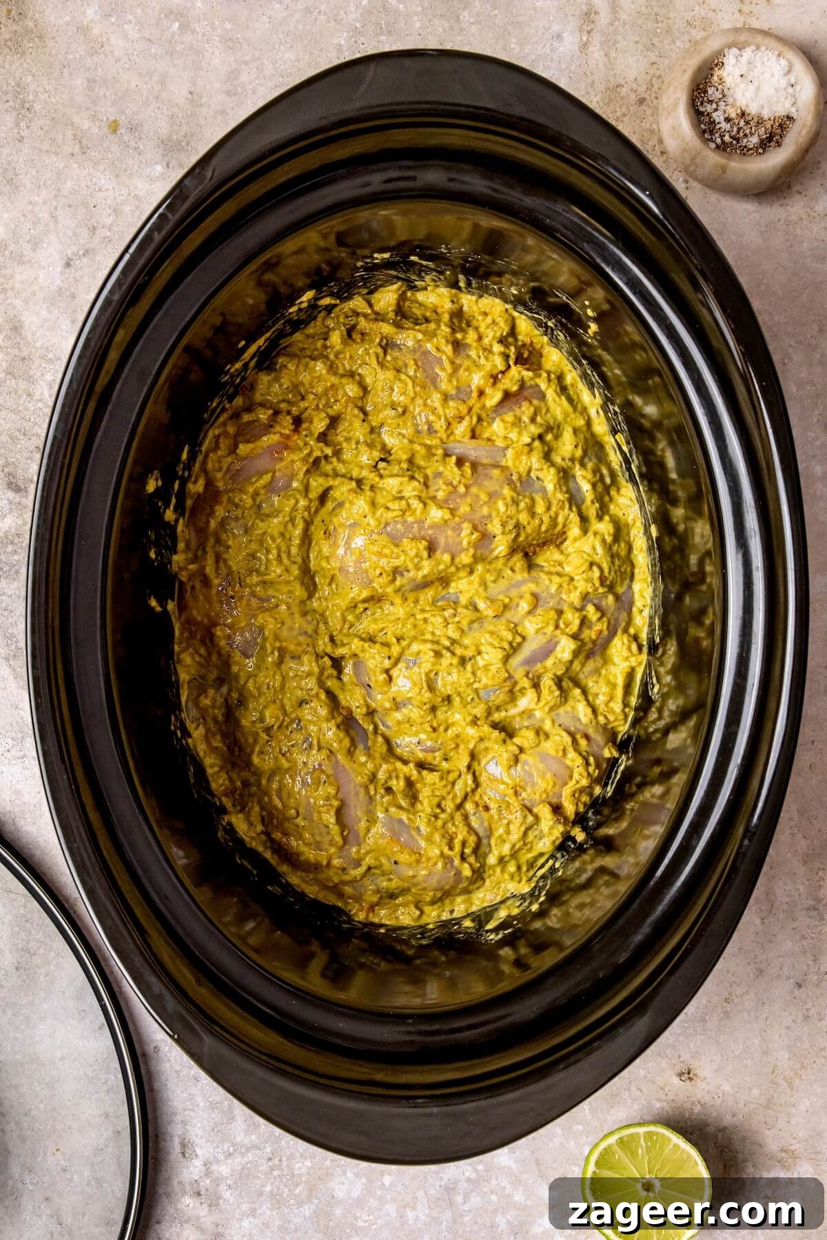 Zesty Slow Cooker Salsa Verde Chicken Tacos 8 Chicken coated in salsa verde mixture in slow cooker