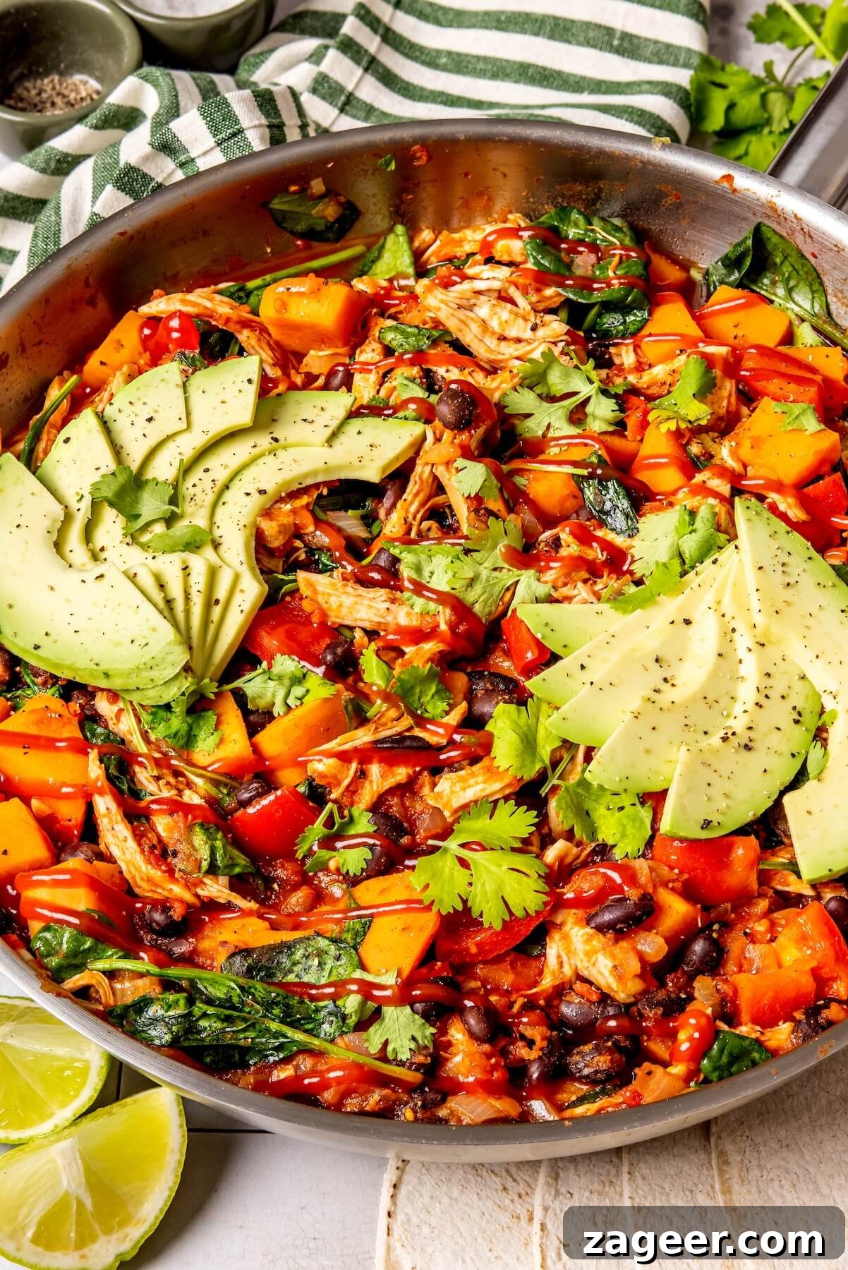 Fiesta Chicken Enchilada Skillet 8 Adding black beans and chicken to the enchilada skillet