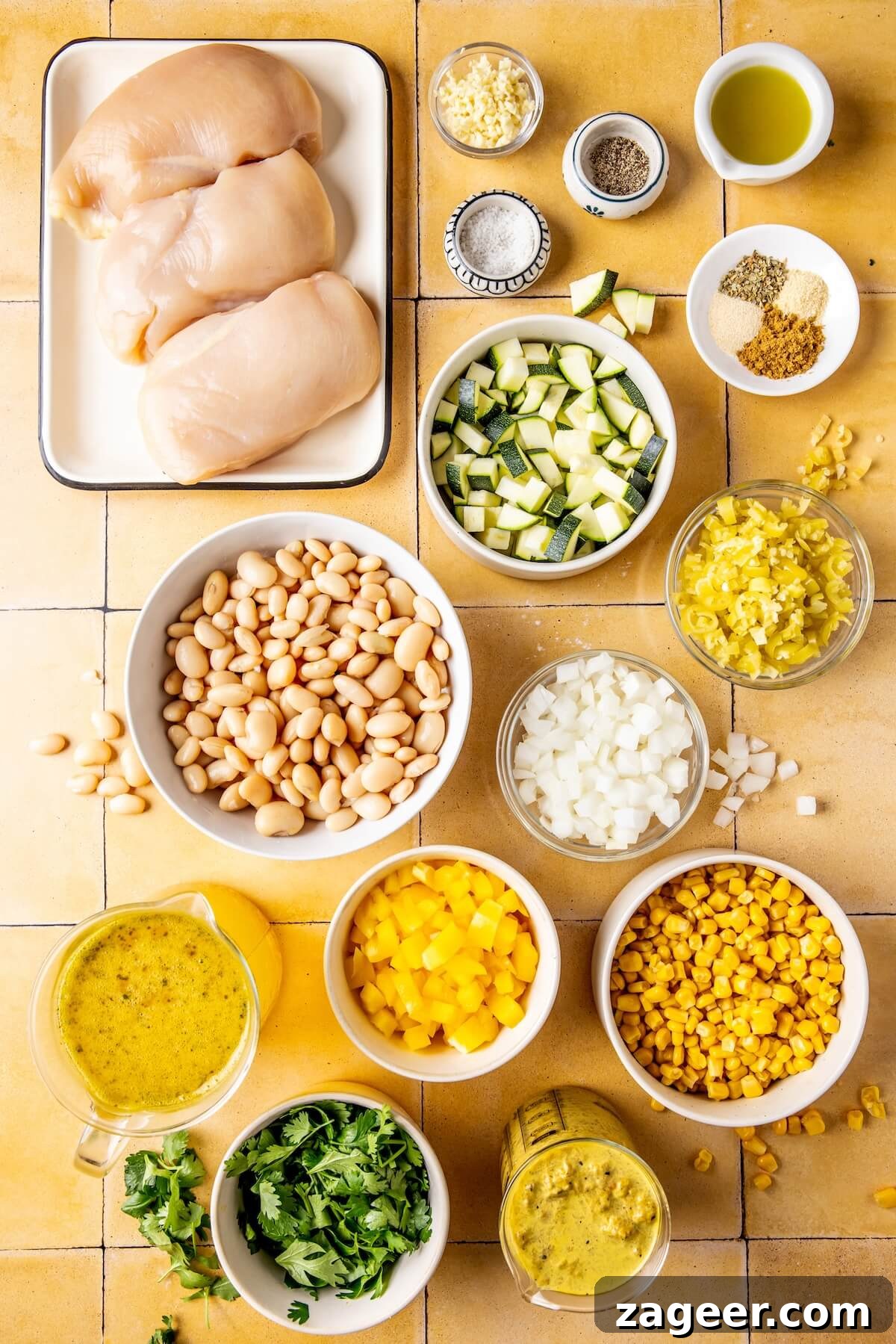 Vibrant Chicken Chili Verde 5 An array of fresh ingredients laid out for Loaded Veggie Salsa Verde Chicken Chili, including chicken, spices, and vegetables.