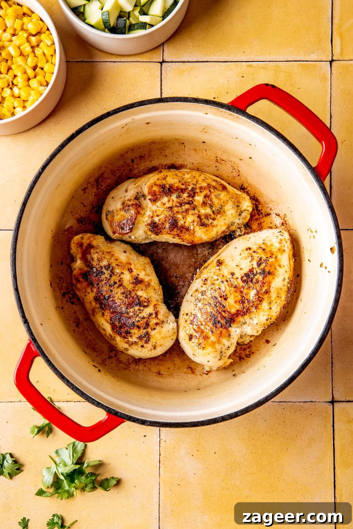 Vibrant Chicken Chili Verde 7 Searing chicken breasts in a Dutch oven until golden.