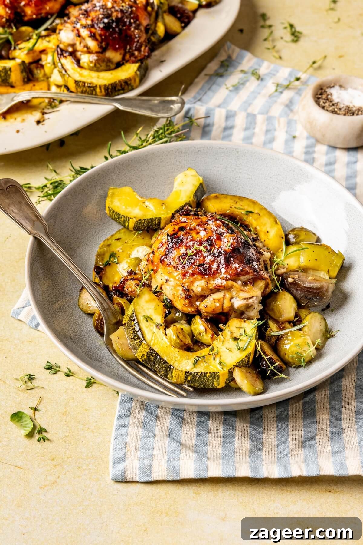 One-Pan Fall Chicken Feast 7 Aromatic roasted chicken and vegetables on a sheet pan, ready to serve