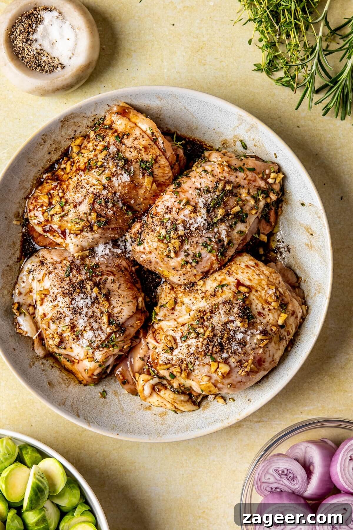 One-Pan Fall Chicken Feast 9 Step 2: Seasoning the chicken generously with salt and pepper